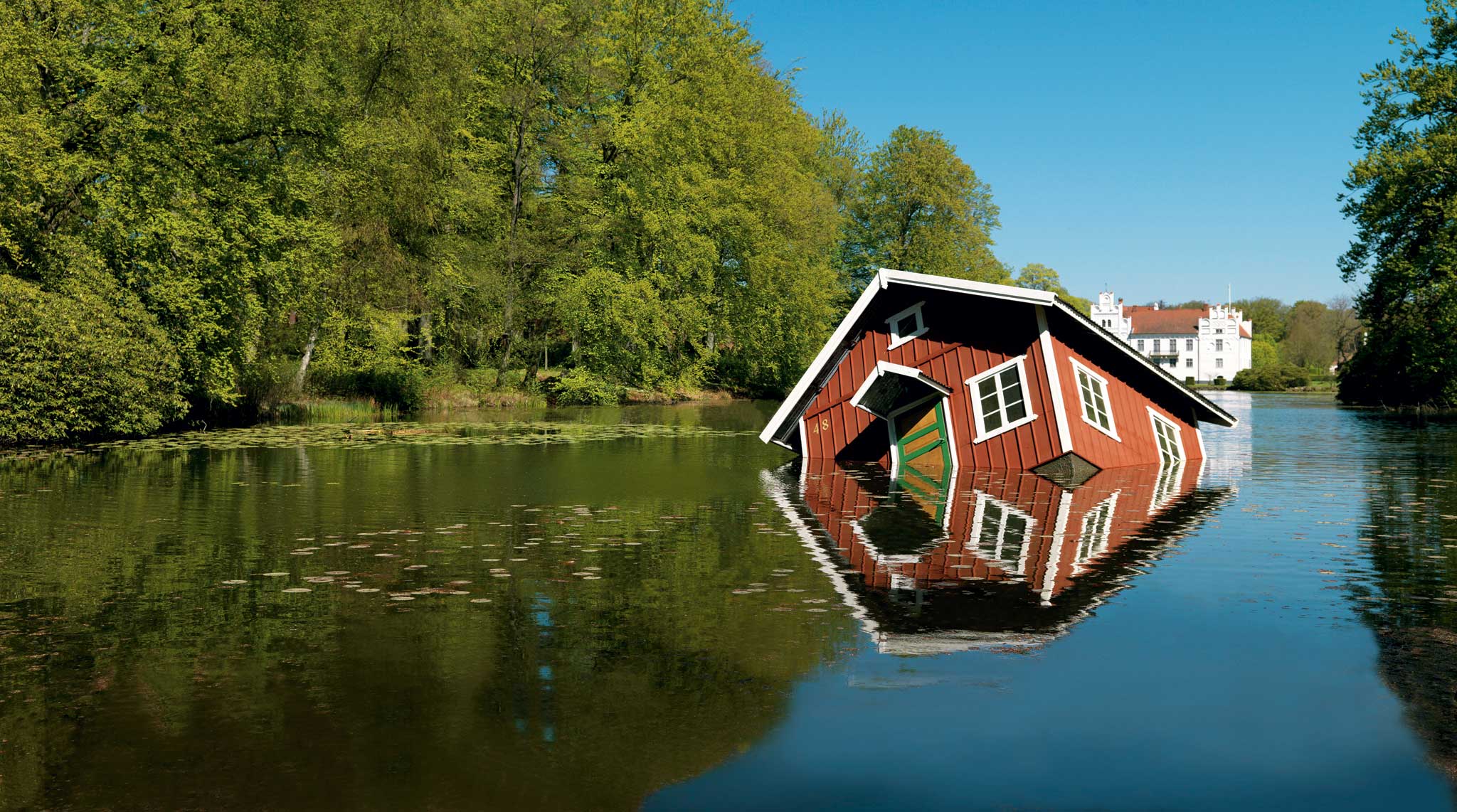 Arresting sight: Atlantis sees a small cabin tilted precariously to one side, and placed in the middle of a lake or river at European destinations such as Budapest and Reykjavik