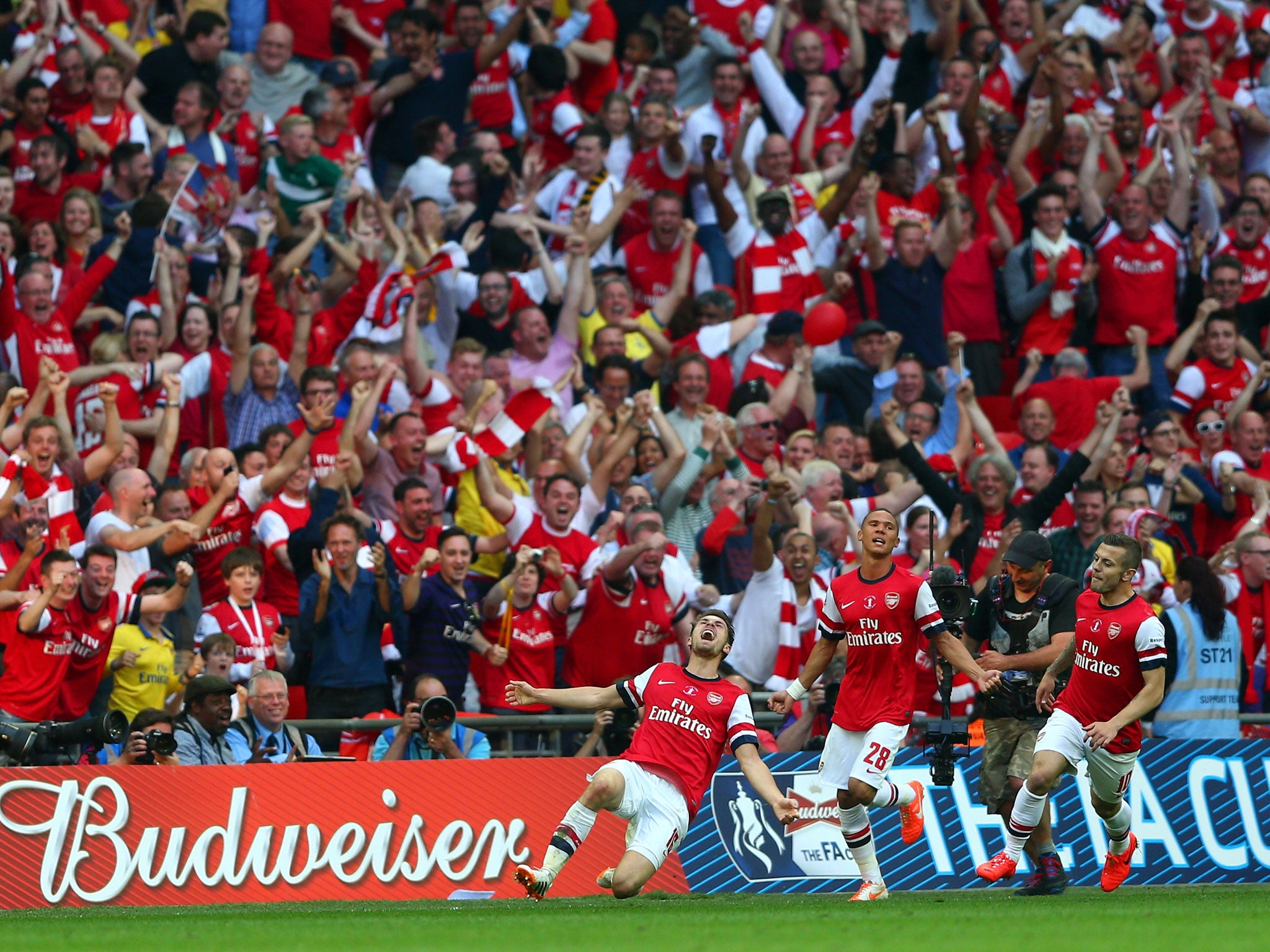 Aaron Ramsey celebrates after scoring the winning goal in injury time