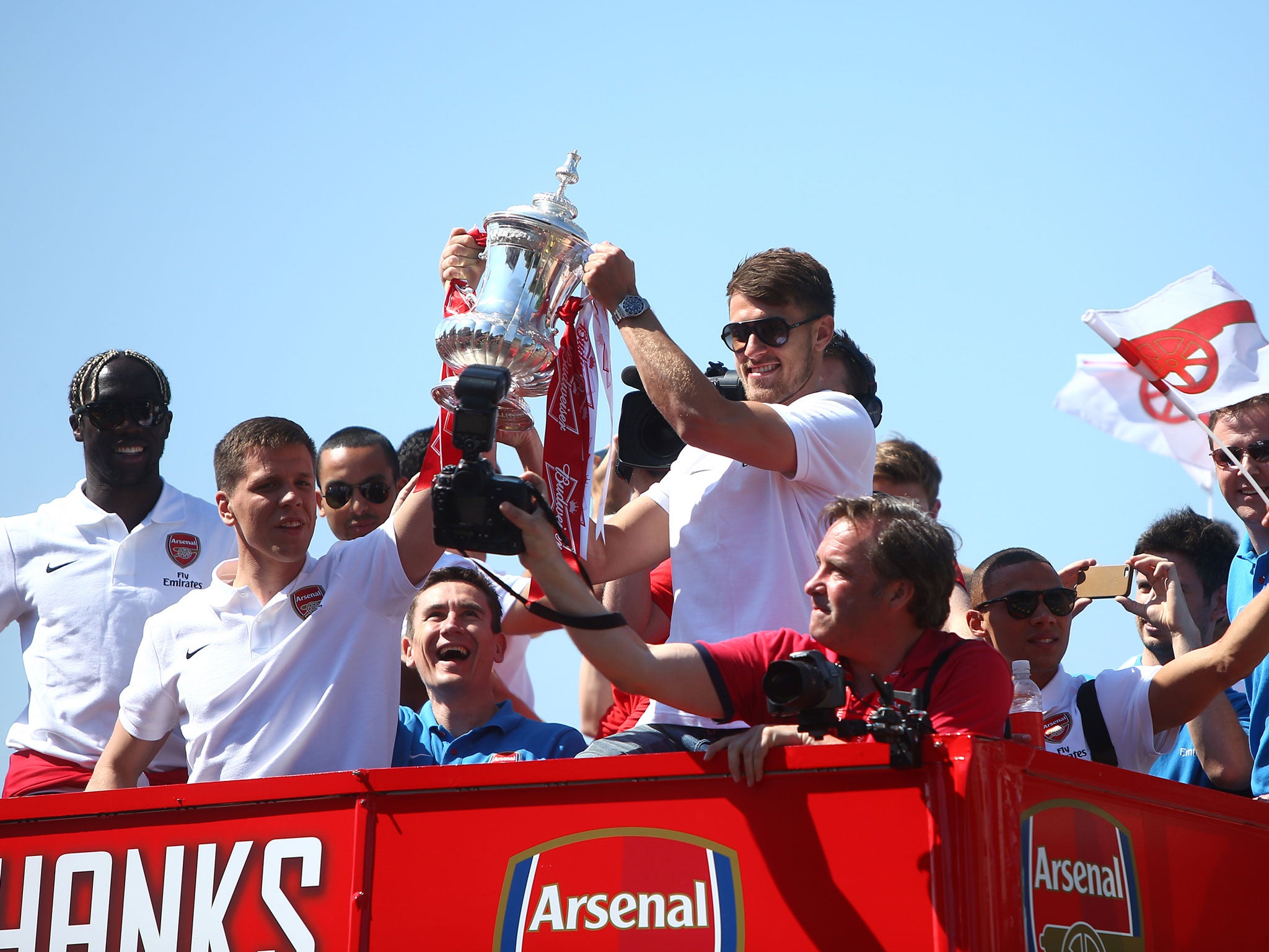 Wojciech Szczesny and Aaron Ramsey of Arsenal lift the FA cup during the Arsenal FA Cup Victory Parade