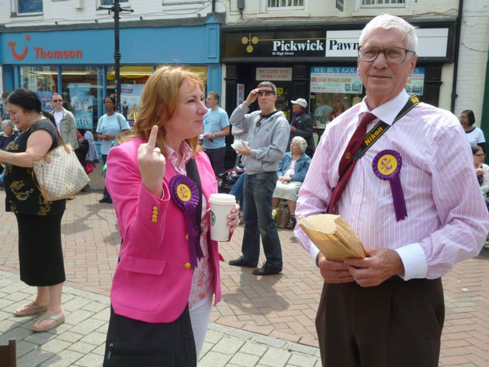 Ms Atkinson showing protesters what she thinks of them