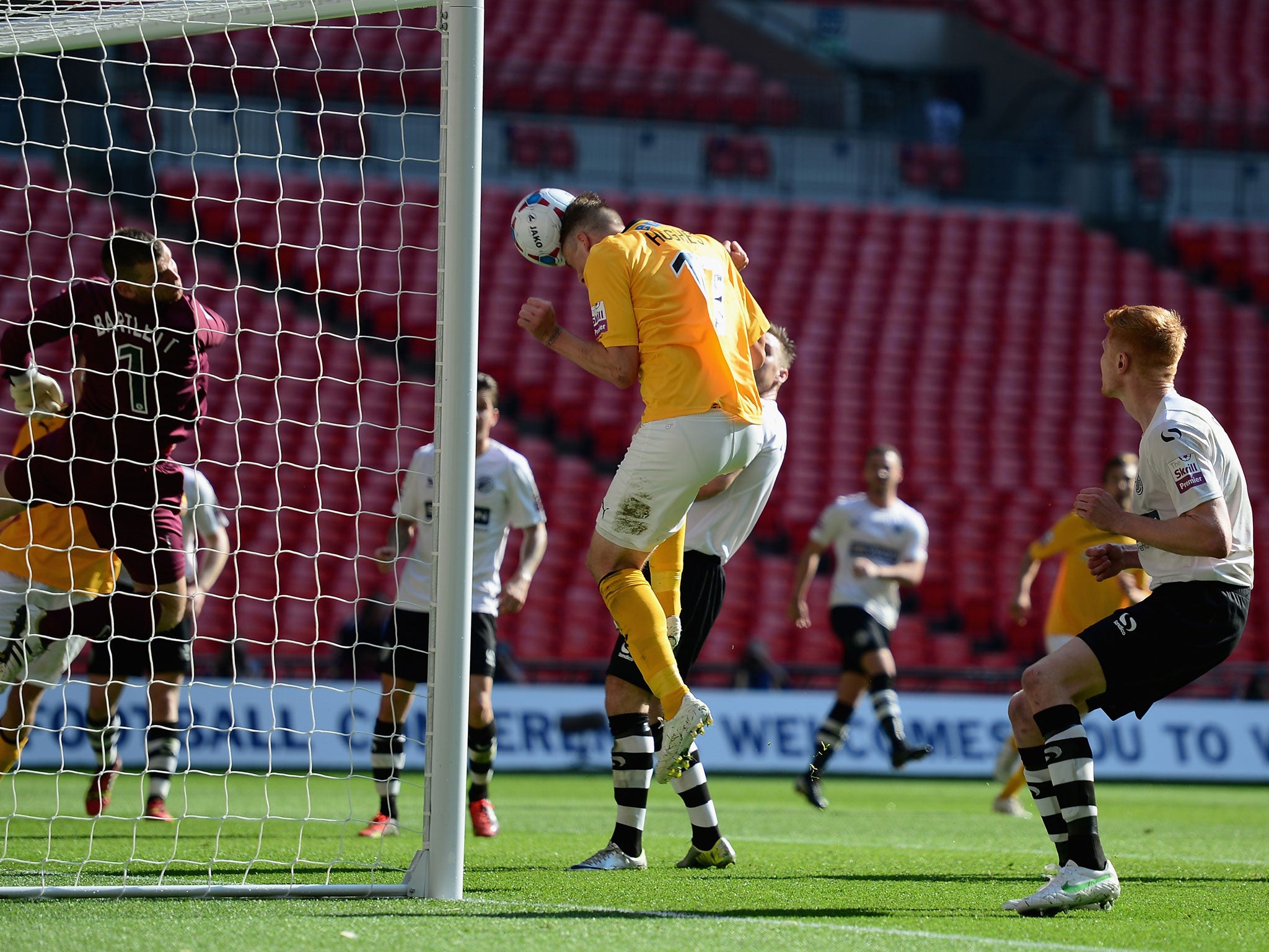 Liam Hughes opens the scoring for Cambridge at Wembley