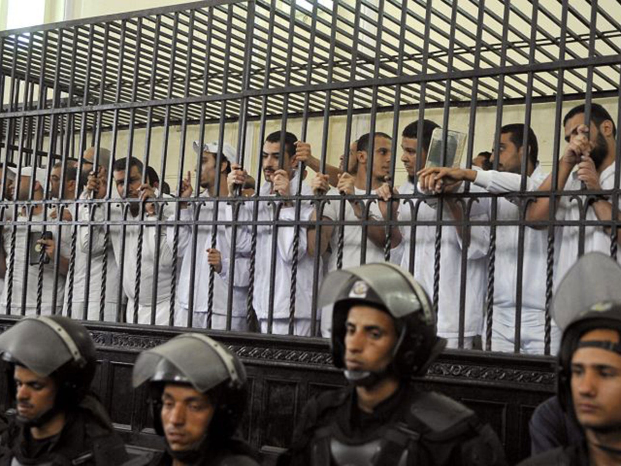 Defendants in court during their trial over violence in Alexandria in 2013 following the ousting of Mohamed Morsi