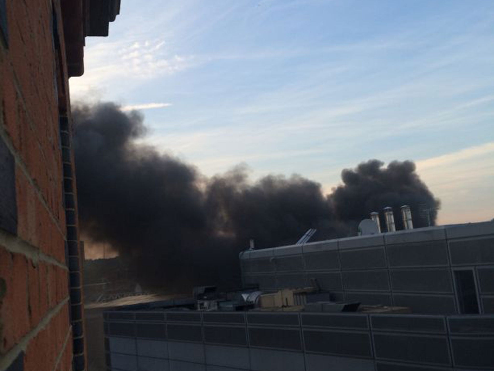 Smoke is seen rising the Stables Market area in Camden