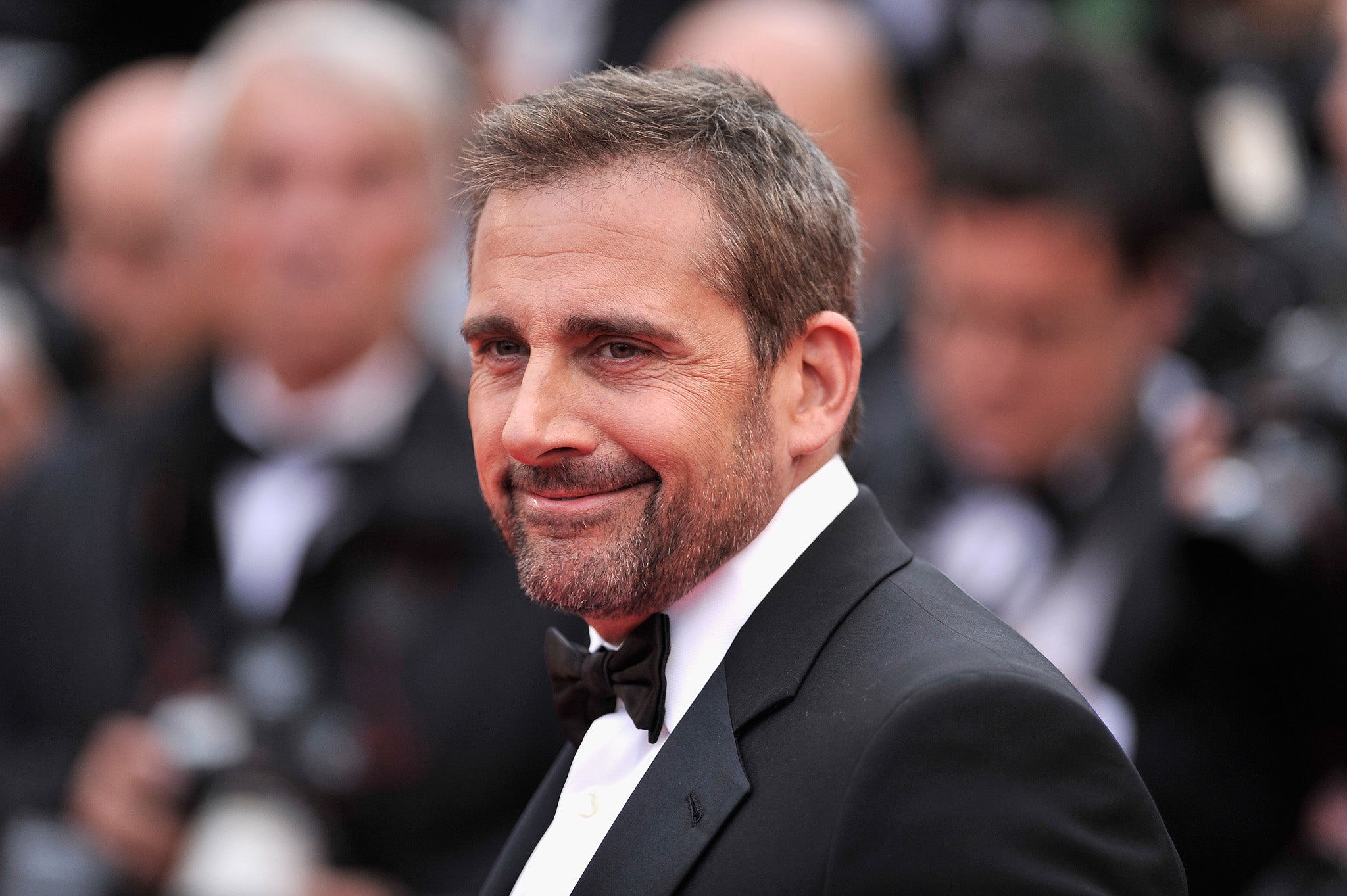 Steve Carell arrives at the premiere for his new film Foxcatcher