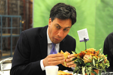 Ed Miliband fails to look normal while eating bacon sandwich