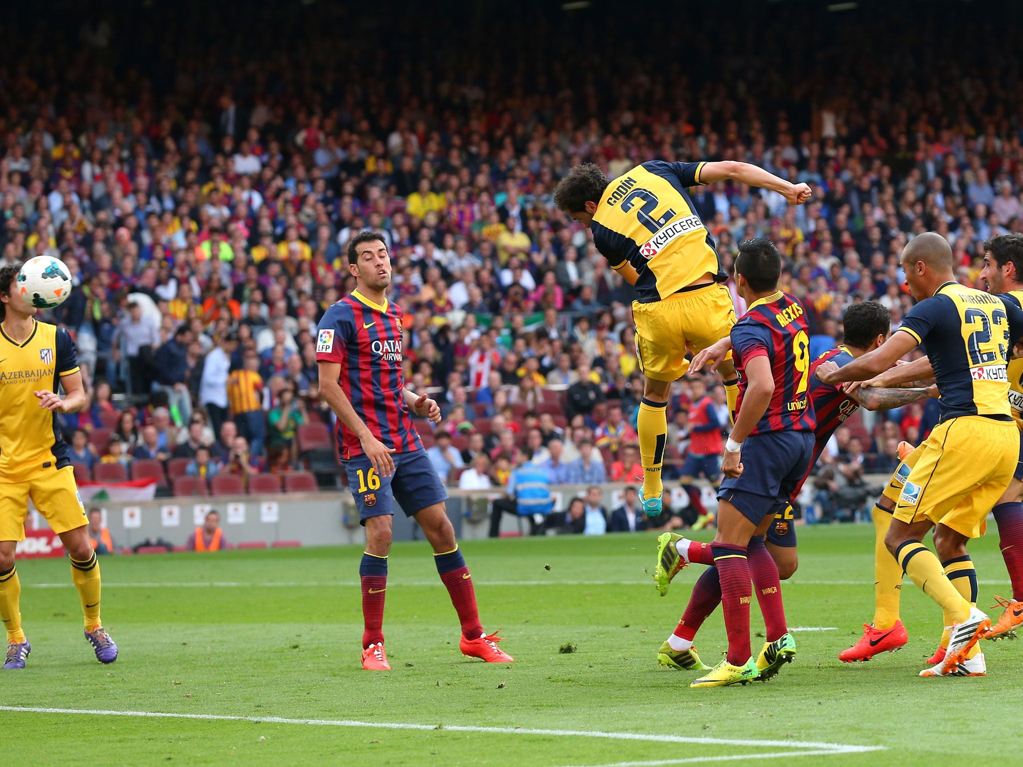 Diego Godin scores a powerful header against Barcelona