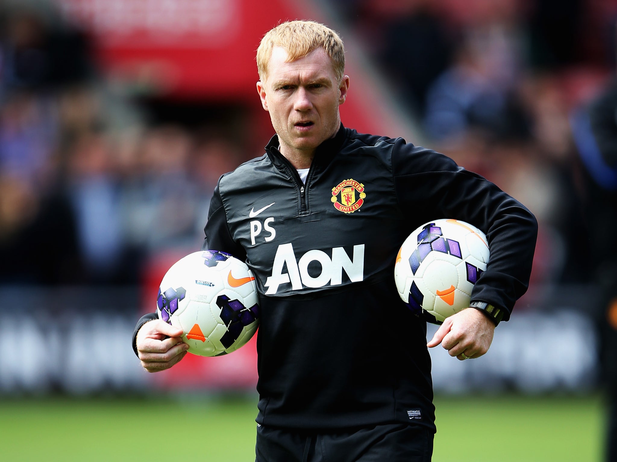 Paul Scholes pictured coaching at Manchester United