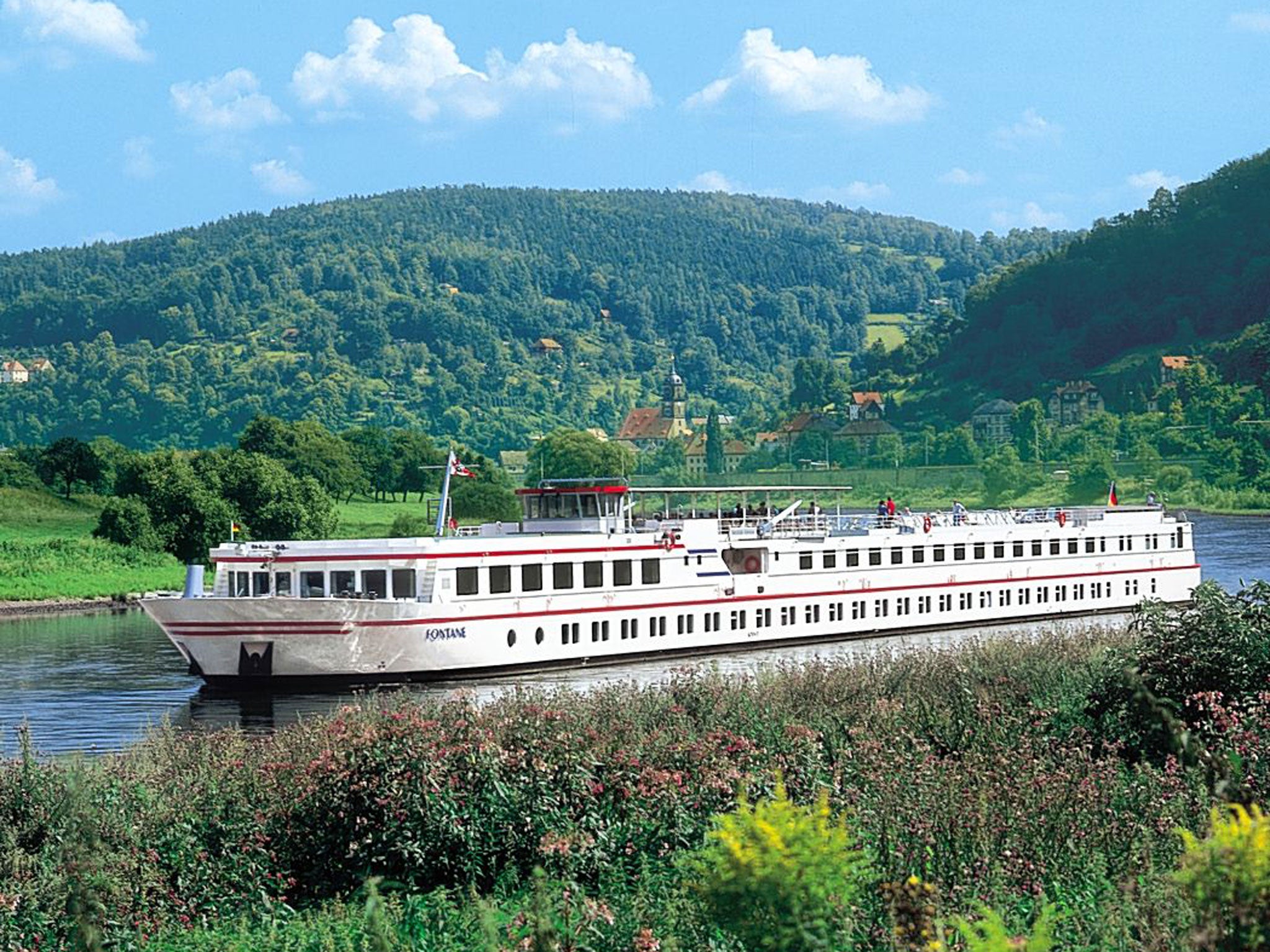 All aboard: Viking's luxury 'Fontane' ship passes down the Elbe