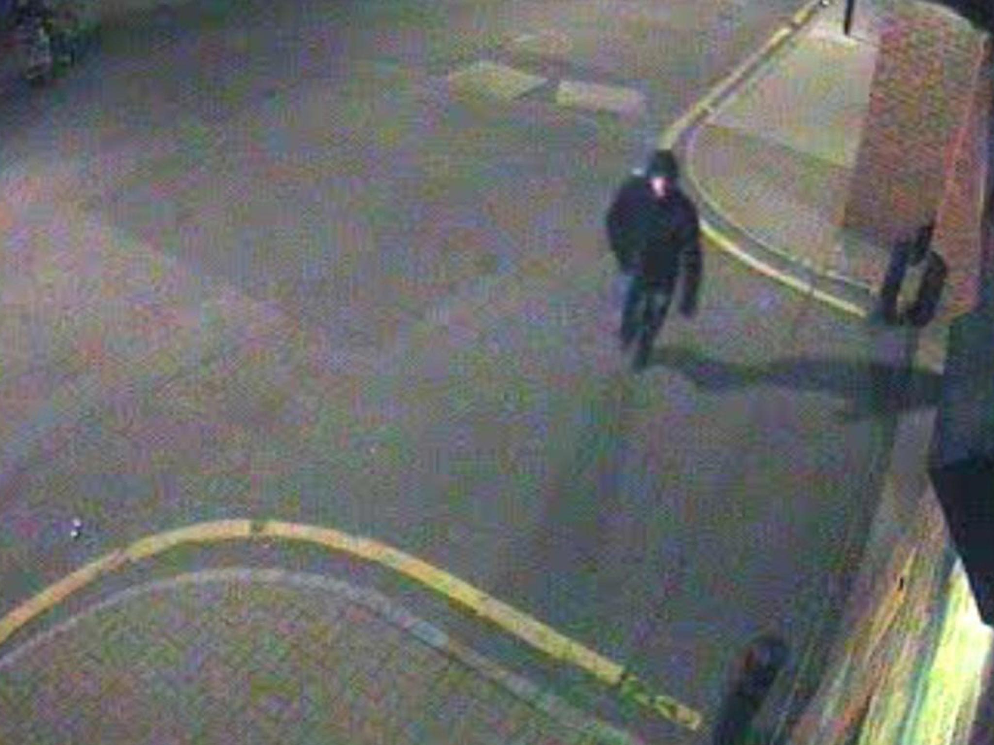 CCTV still of the gunman moments after German Gorbuntsov was shot as he entered his block of flats near Canary Wharf in March 2012