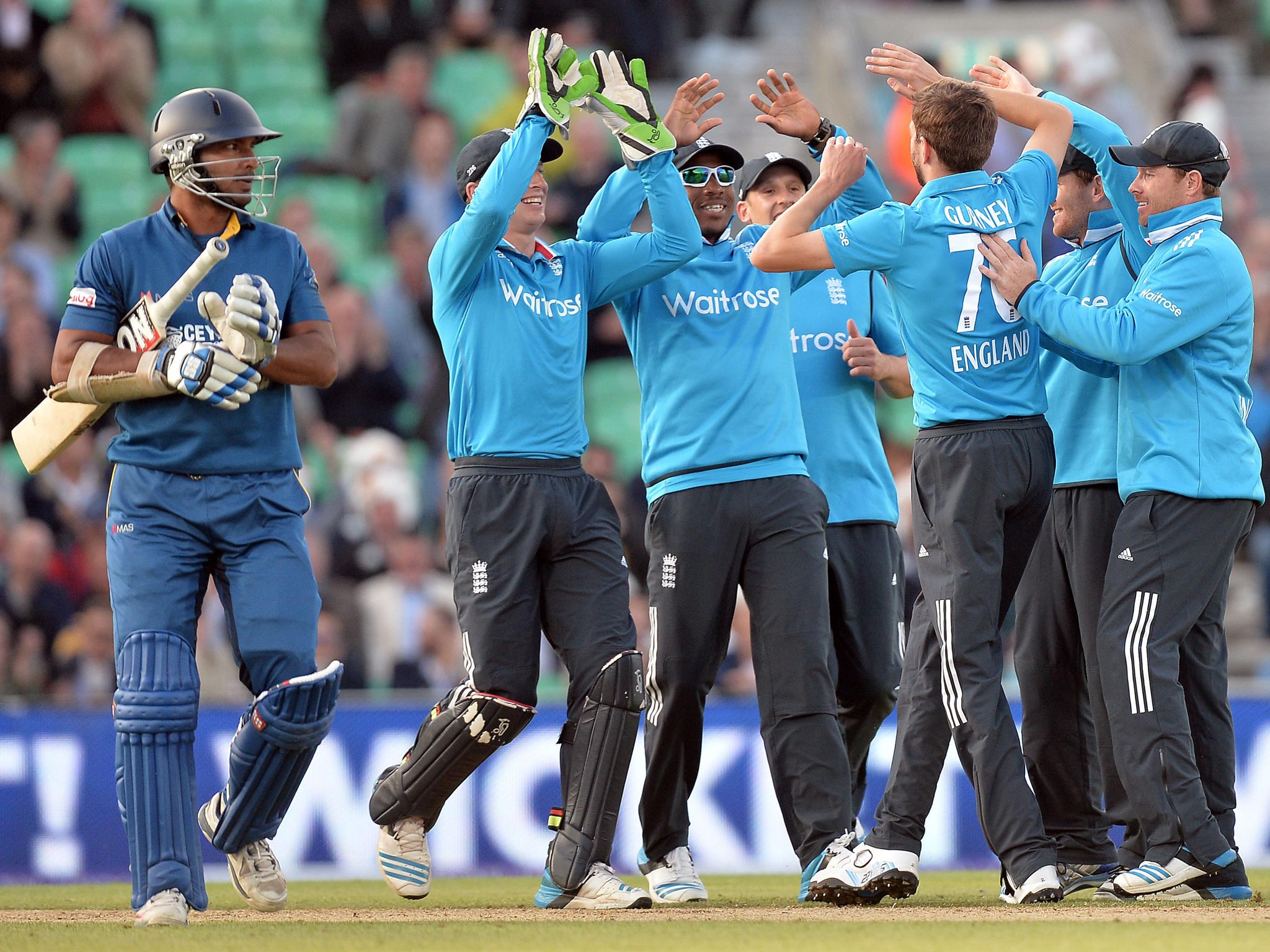 Harry Gurney accepts the plaudits of his teammates
after making Kumar Sangakkara play on