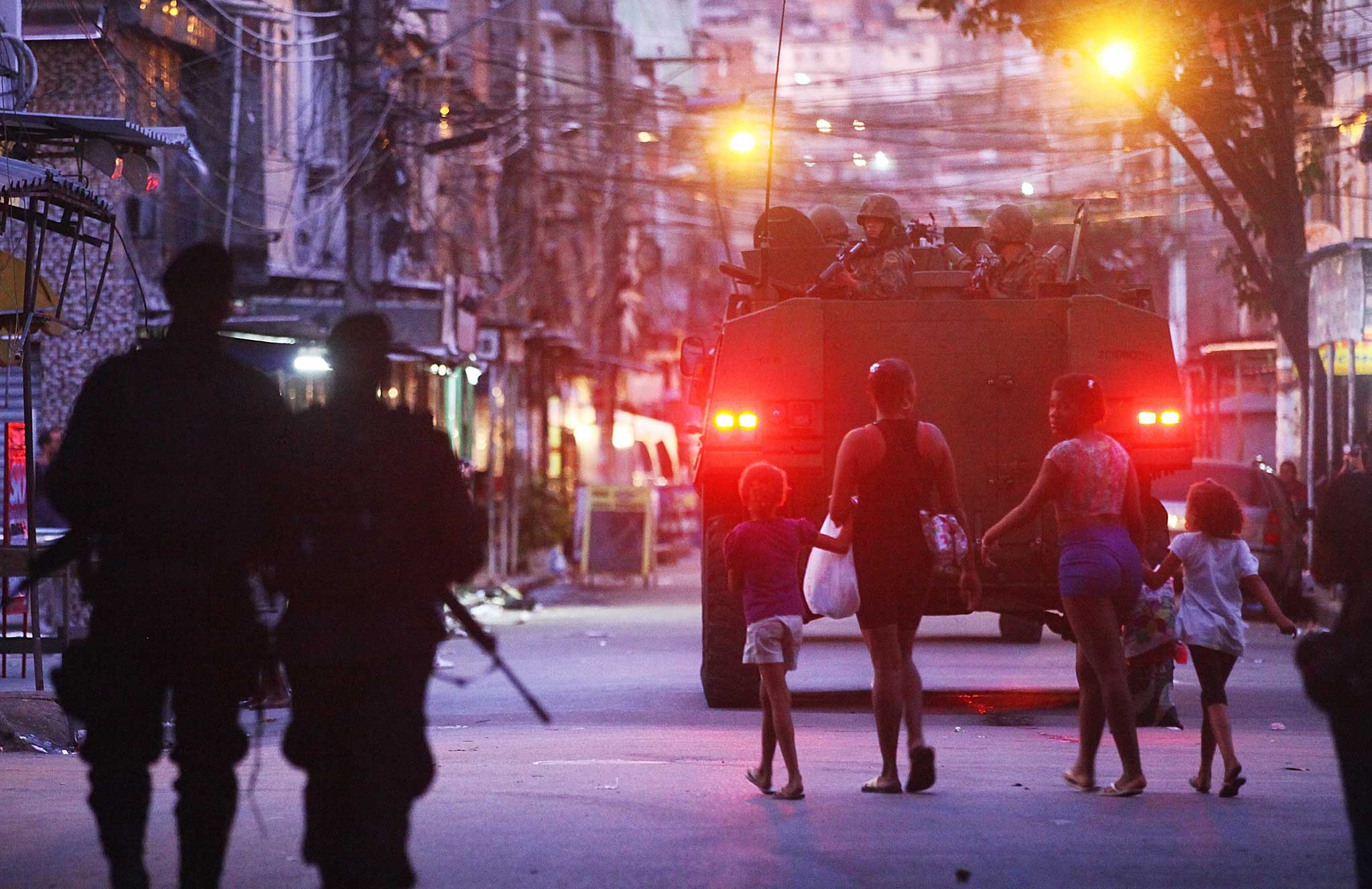 Navy soldiers patrol the Complexo da Mare - one of the largest 'favela' complexes in Rio - in March (Getty)