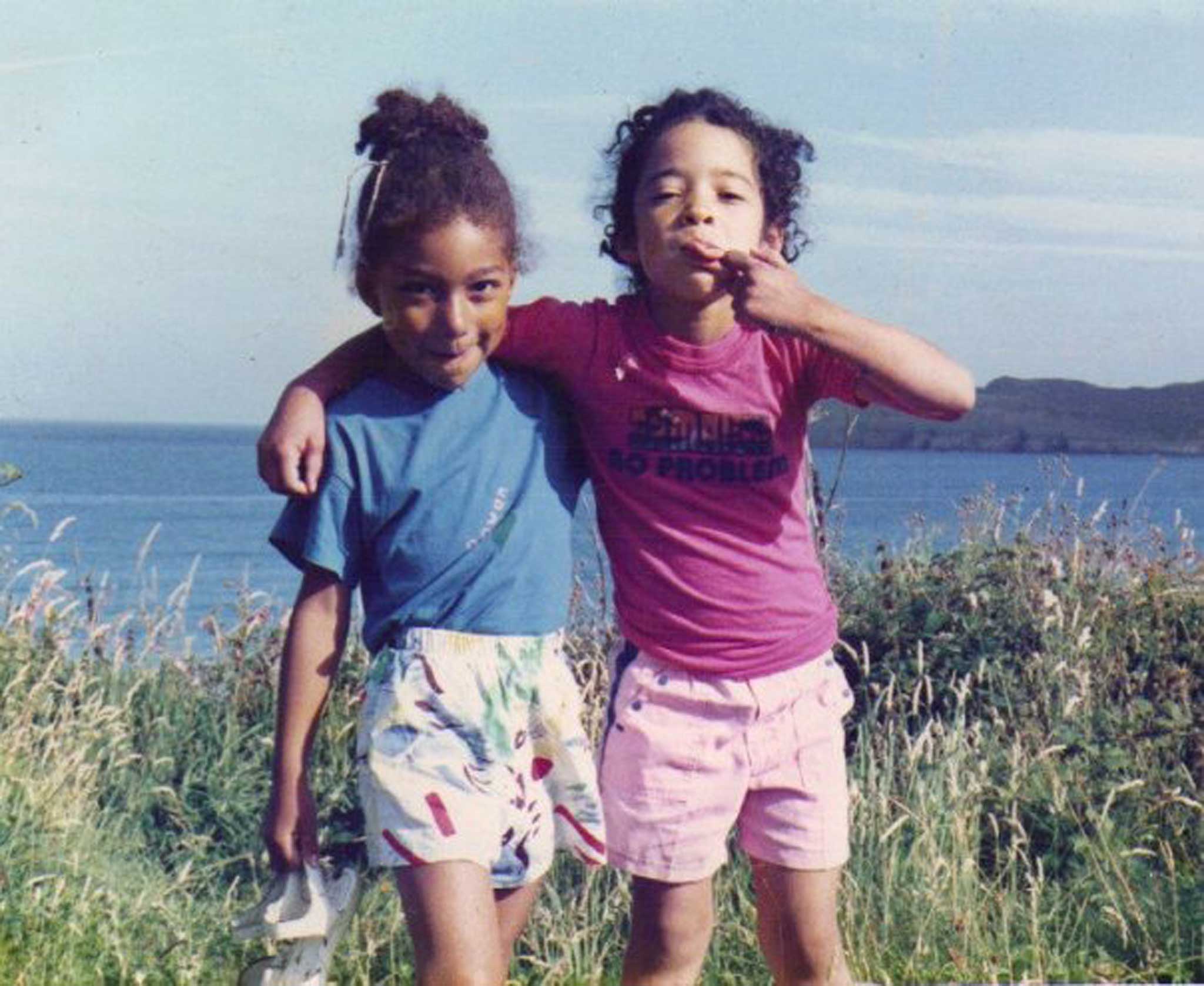 Idyllic childhood: Ellen E Jones (right) on holiday in the 1990s