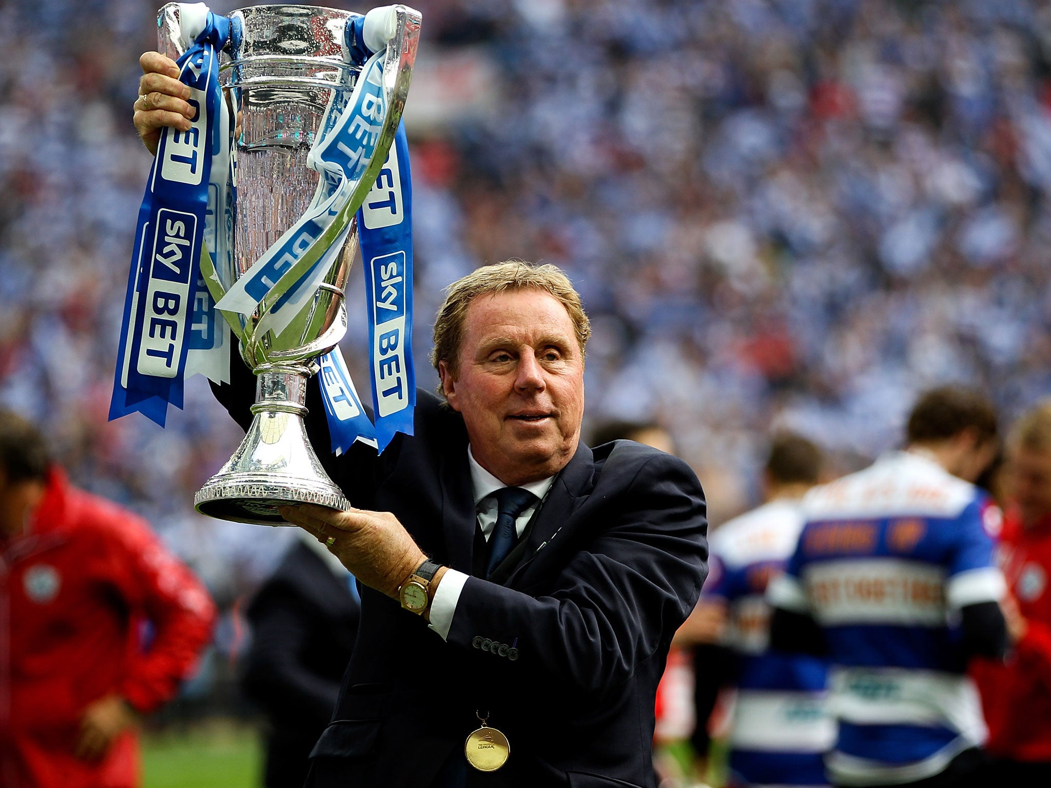 Harry Redknapp lifts the Championship play-off trophy