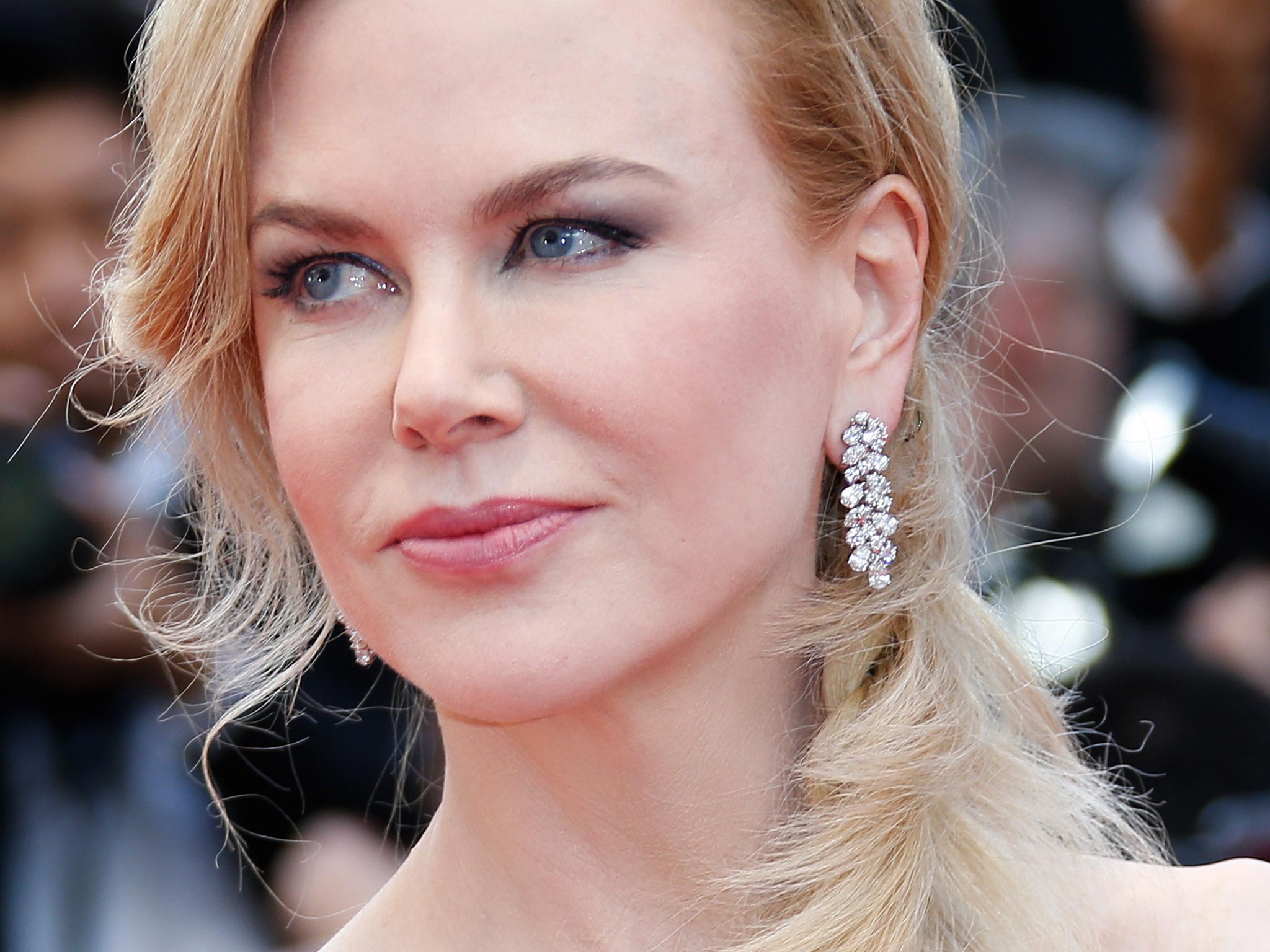 Nicole Kidman poses as she arrives for the Opening Ceremony and the screening of her film "Grace of Monaco" at the Cannes Film Festival