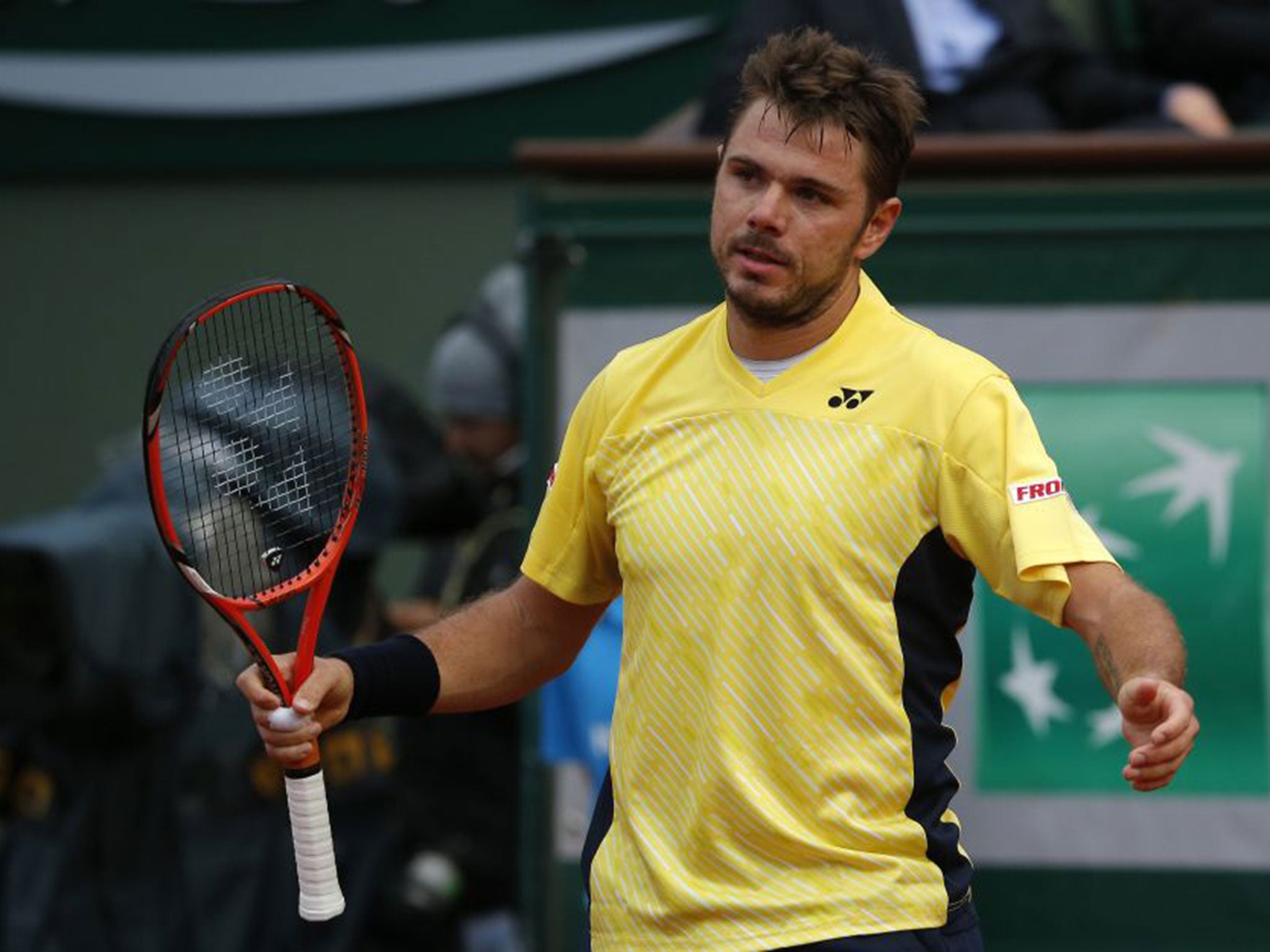 Stanislas Wawrinka, the Australian Open champion, shows his exasperation during his defeat by Guillermo Garcia-Lopez yesterday