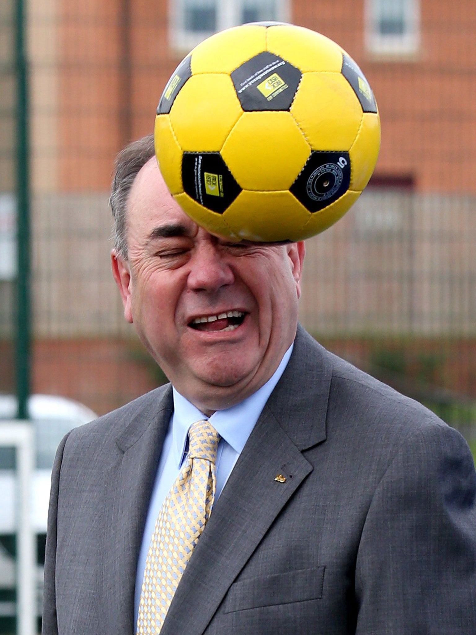 Alex Salmond heads a ball