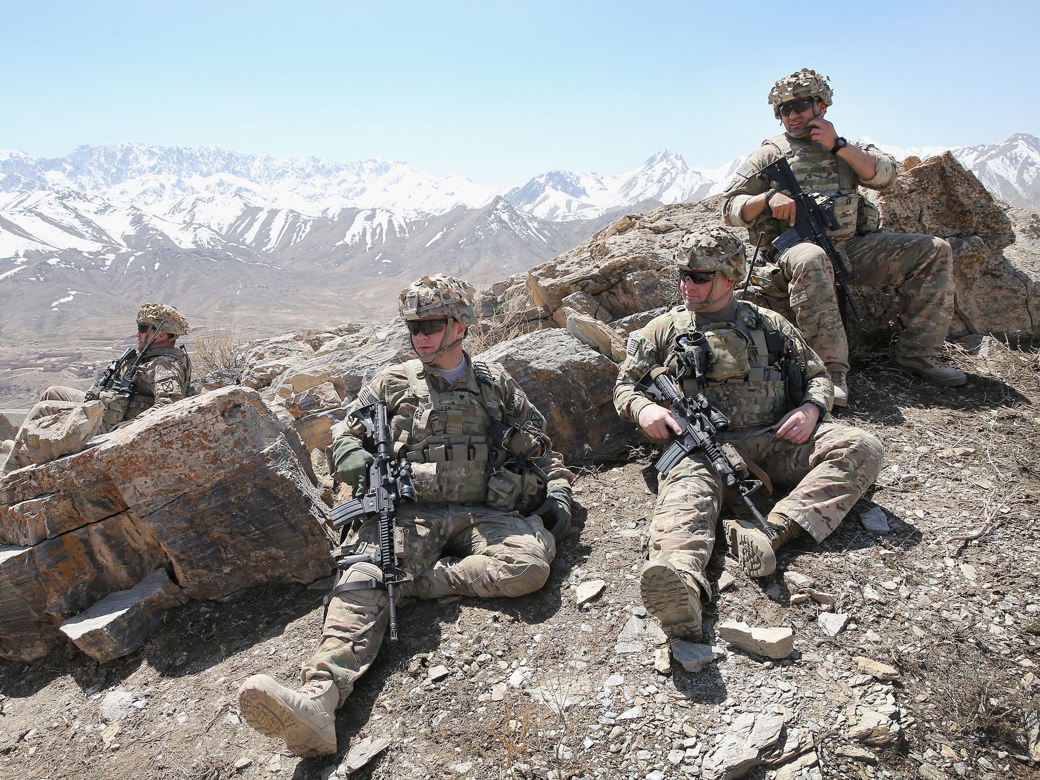 Soldiers with the U.S. Army rest near Pul-e Alam, Afghanistan. (Getty Images)