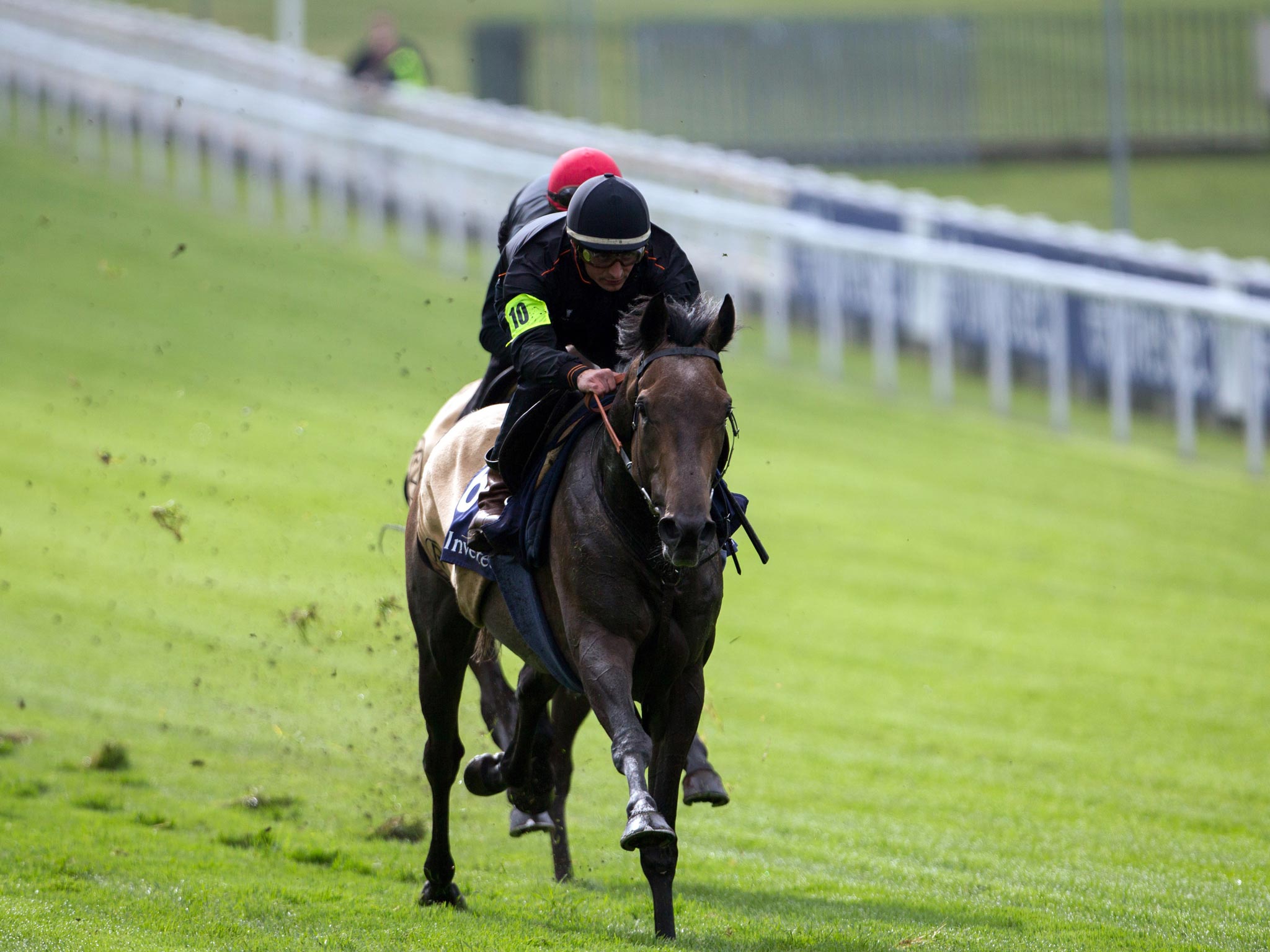 Andrea Atzeni rides the Derby contender Kingston Hill in a gallop at Epsom yesterday