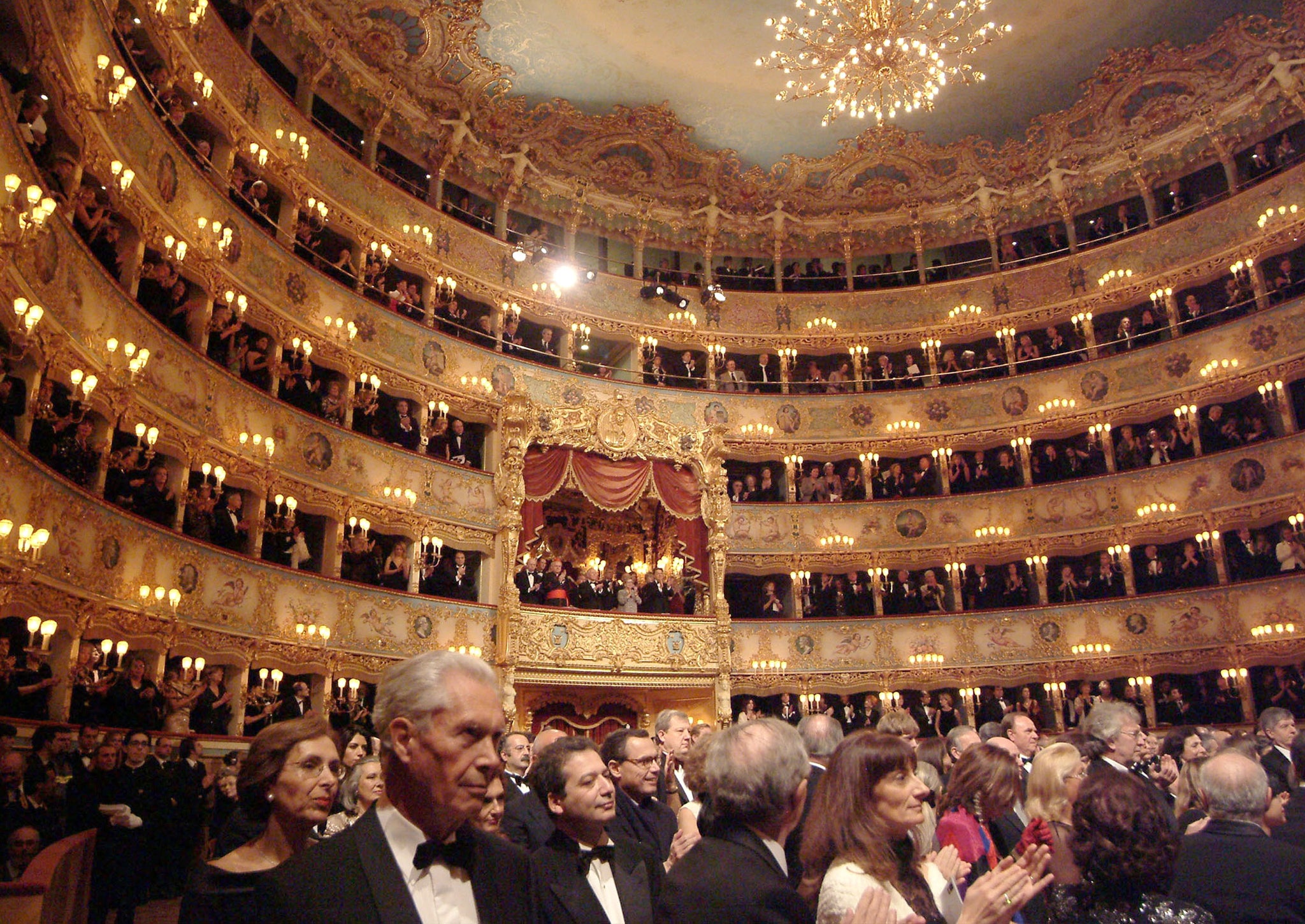 All doled up: Punters at a Venetian opera house