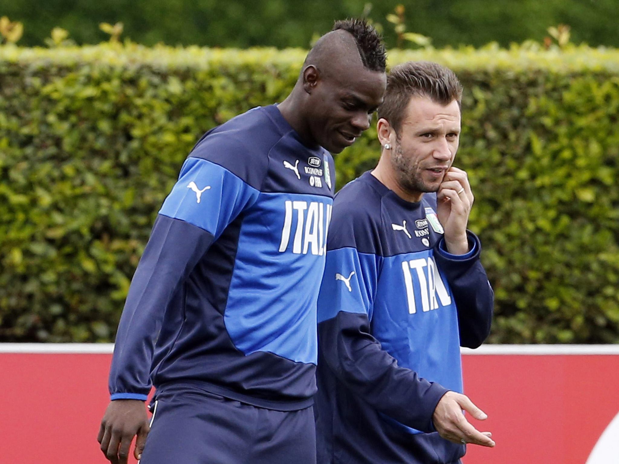 Possible strike partners Mario Balotelli and Antonio Cassano with the provisional Italian squad at their training camp near Florence this week