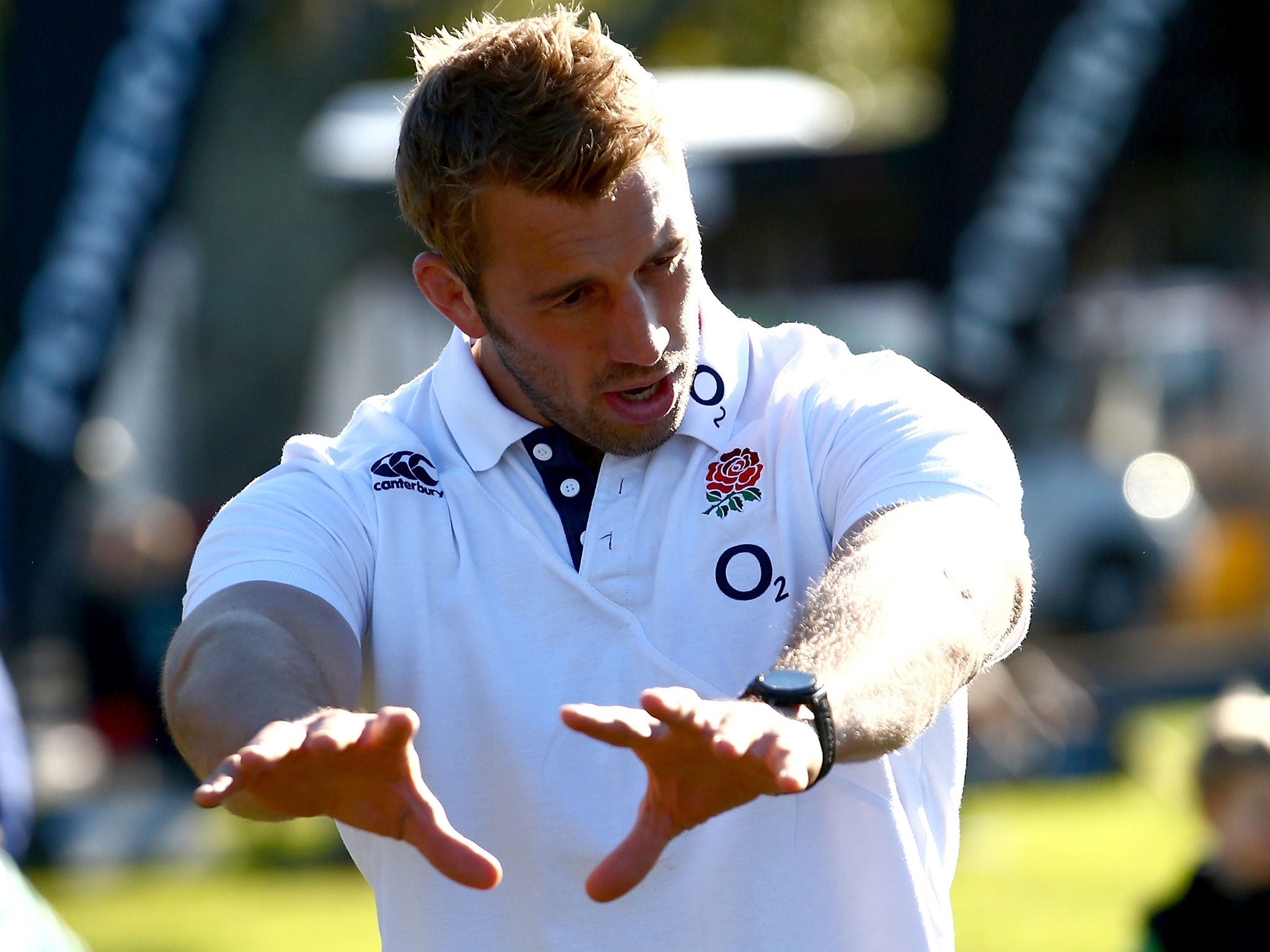 Chris Robshaw of England takes part in a coaching clinic with Ponsonby Junior rugby players