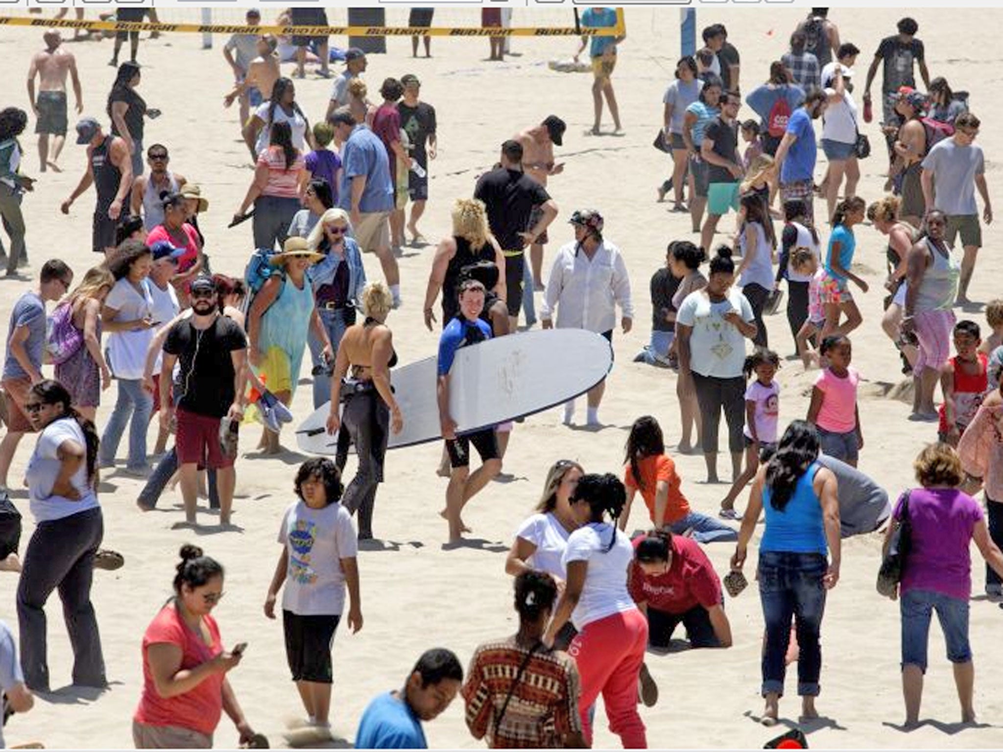 Hundreds of people search for 36 buried plastic Angry Bird orbs filled with hidden cash in Hermosa Beach, California