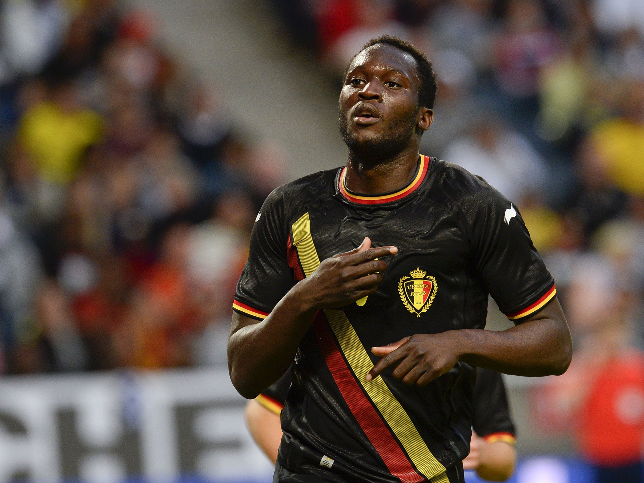 Belgium striker Romelu Lukaku celebrates scoring against Sweden