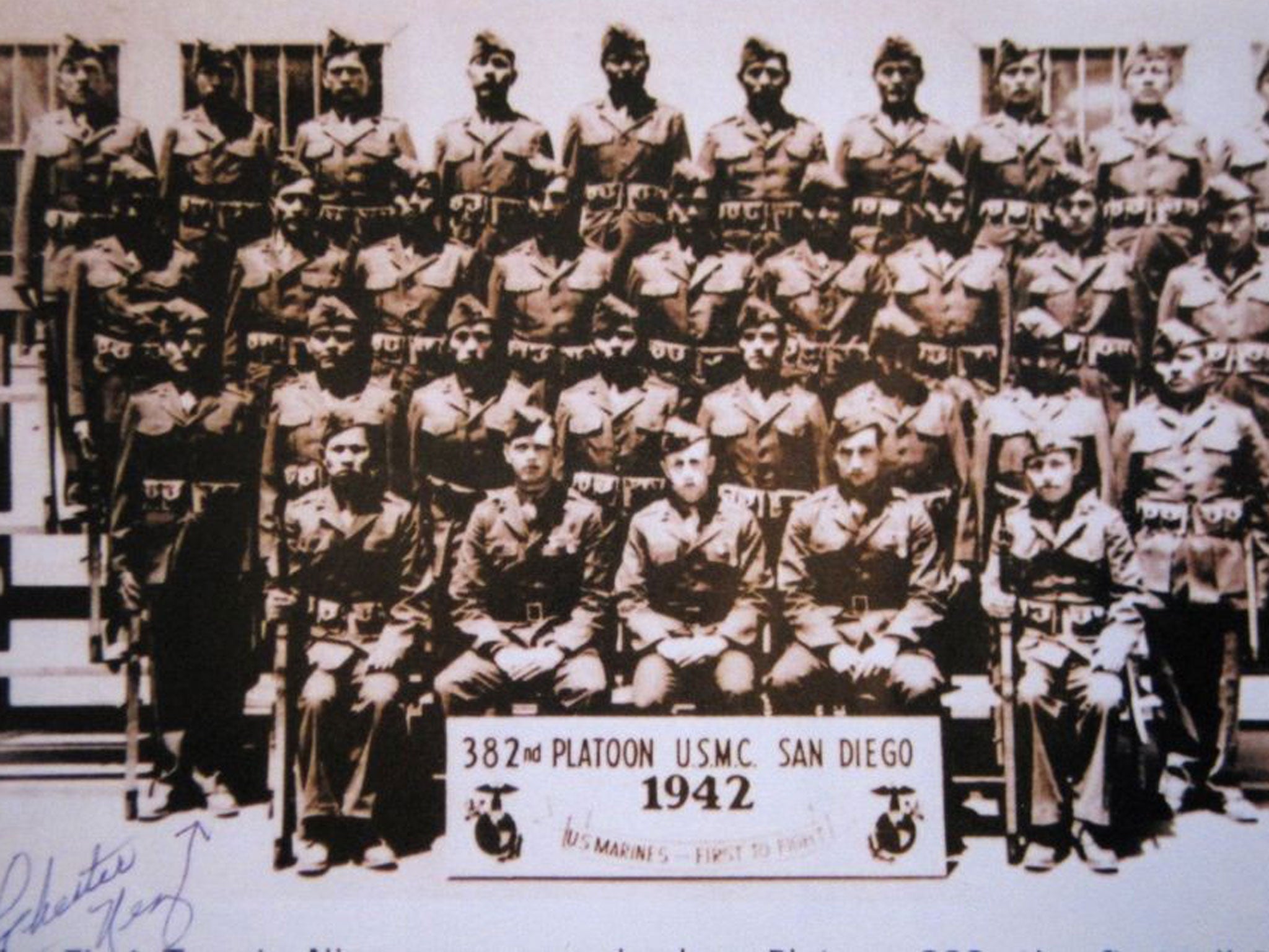 Chester Nez, standing front left, poses with the first group of Navajo code talkers in 1942 in San Diego