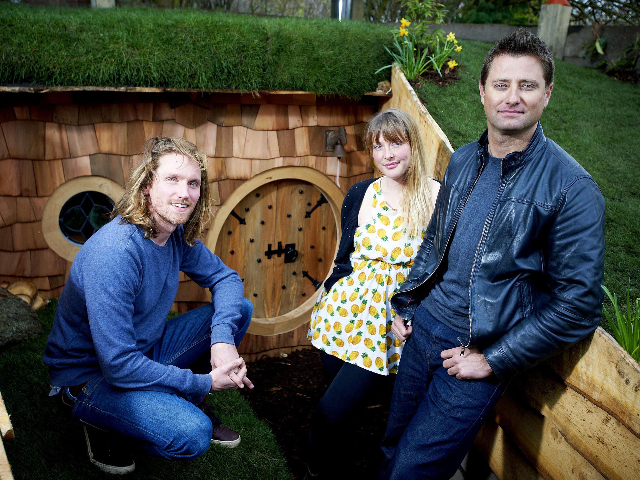 Grass act: George Clarke (right) with Olly and Tamsin from Bolton