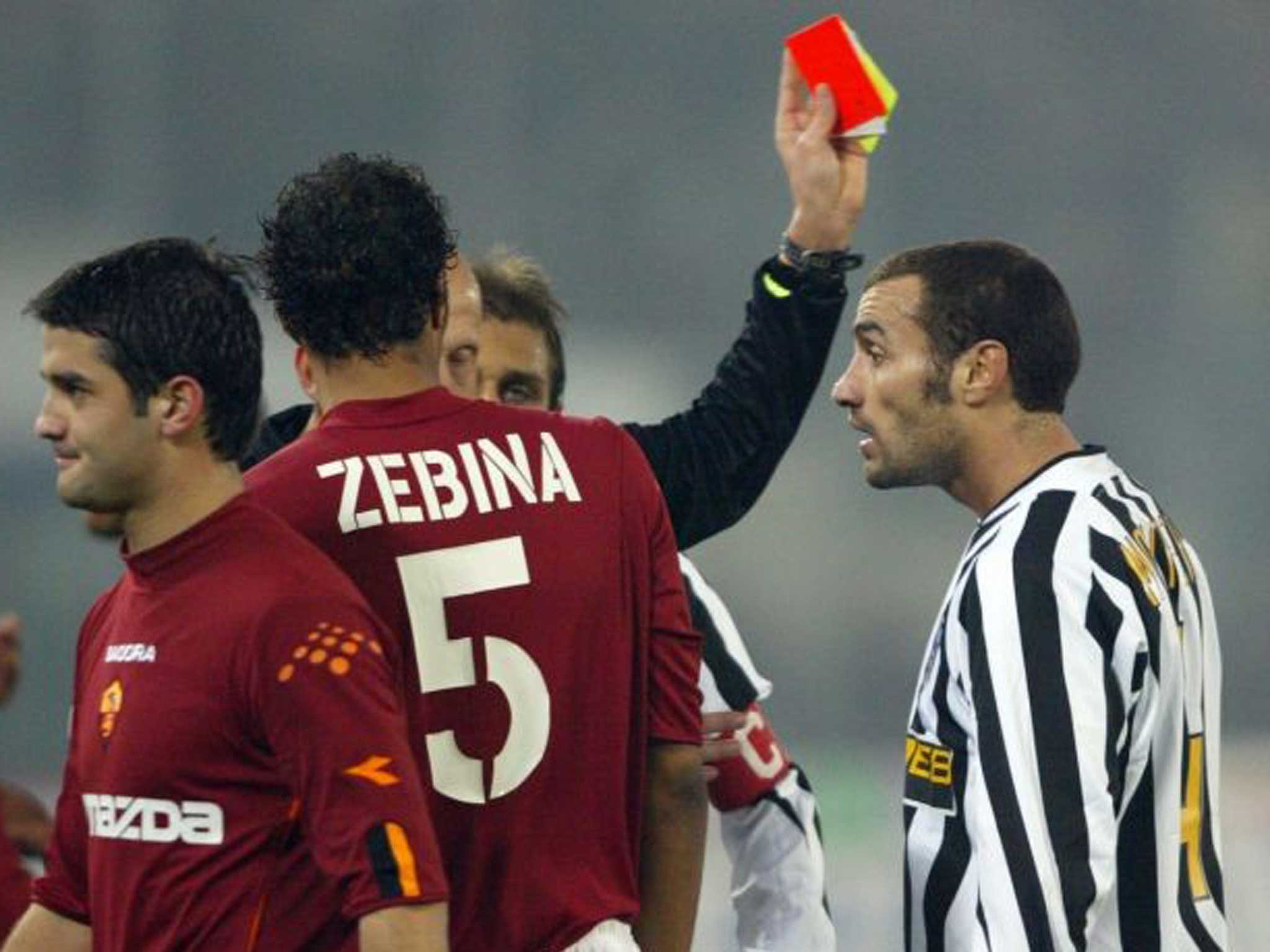 What, me ref? Paolo Montero collects a familiar red card