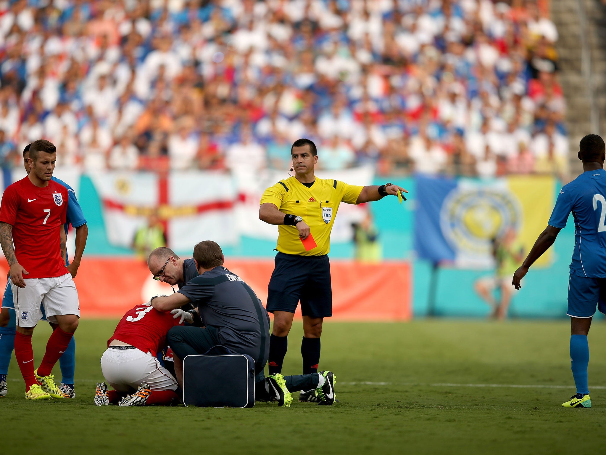 Ricardo Salazar sends off Brayan Beckeles of Honduras for a challenge on Leighton Baines of England during the International Friendly match between England and Honduras