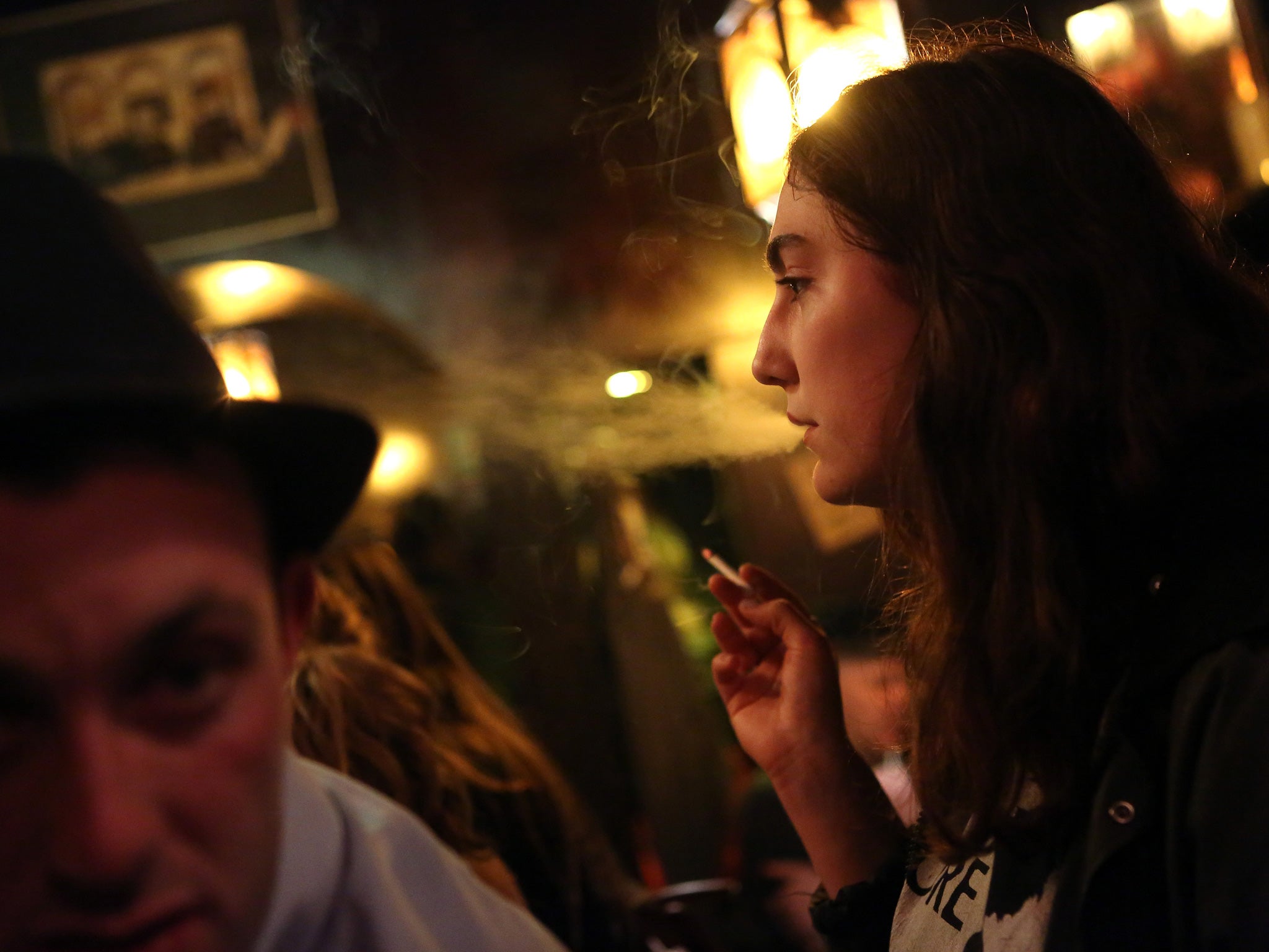 Passive smokers have greater risk of hearing loss than smokers. Image source: Getty Images