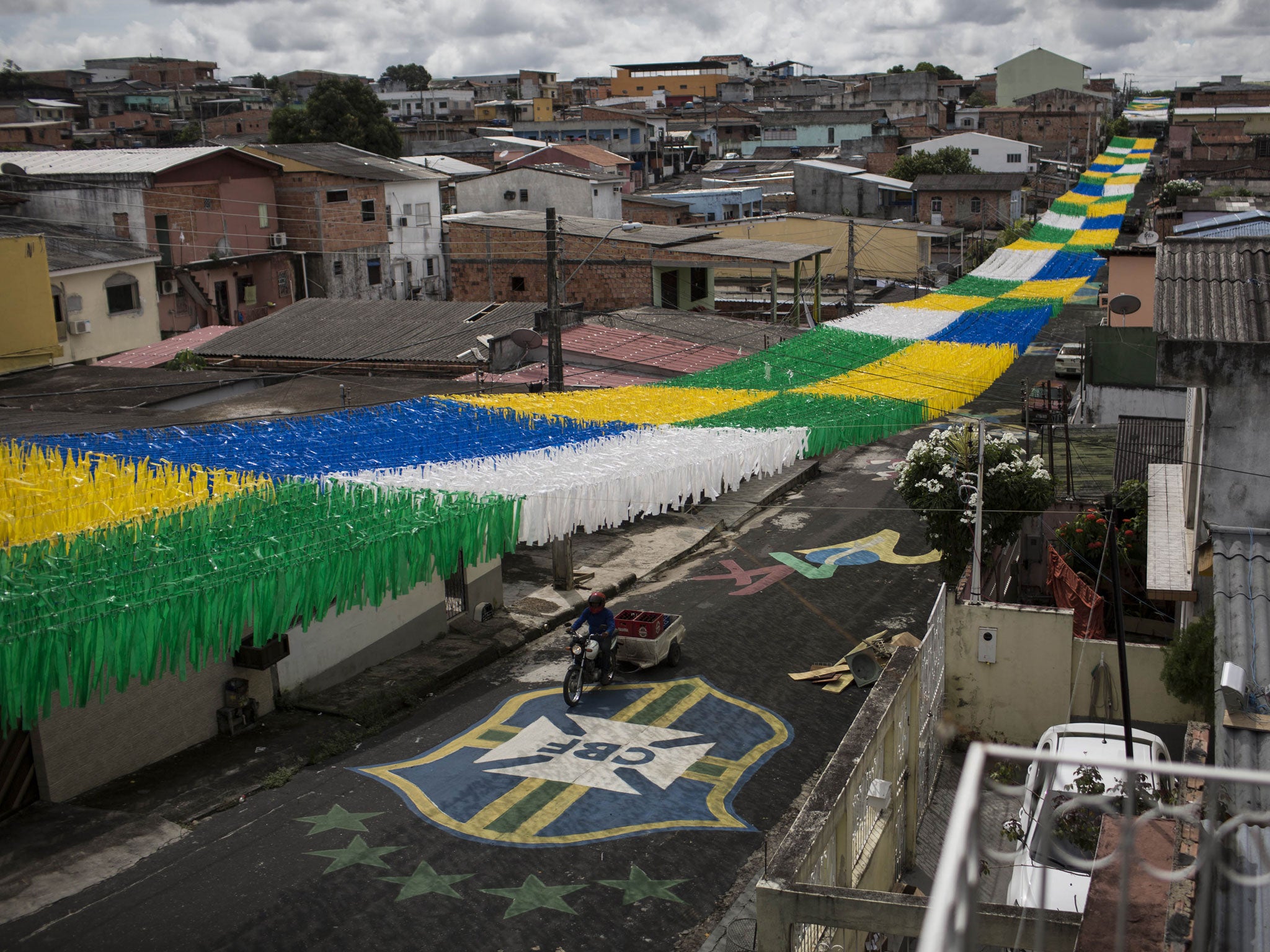 A canopy of ribbons on a street in Manaus