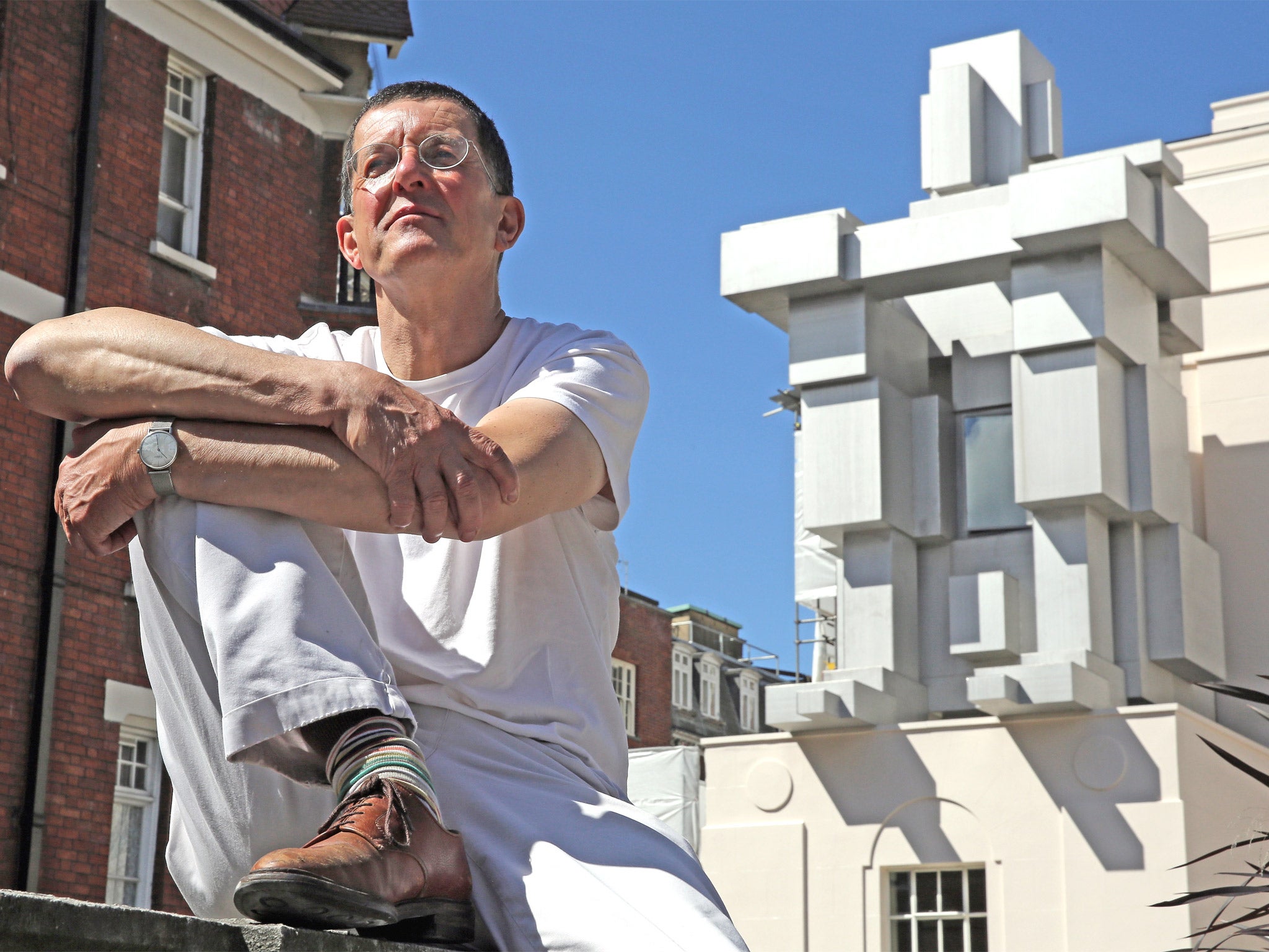 British Artist Anthony Gormley in front of a new piece of work entitled 'Room'