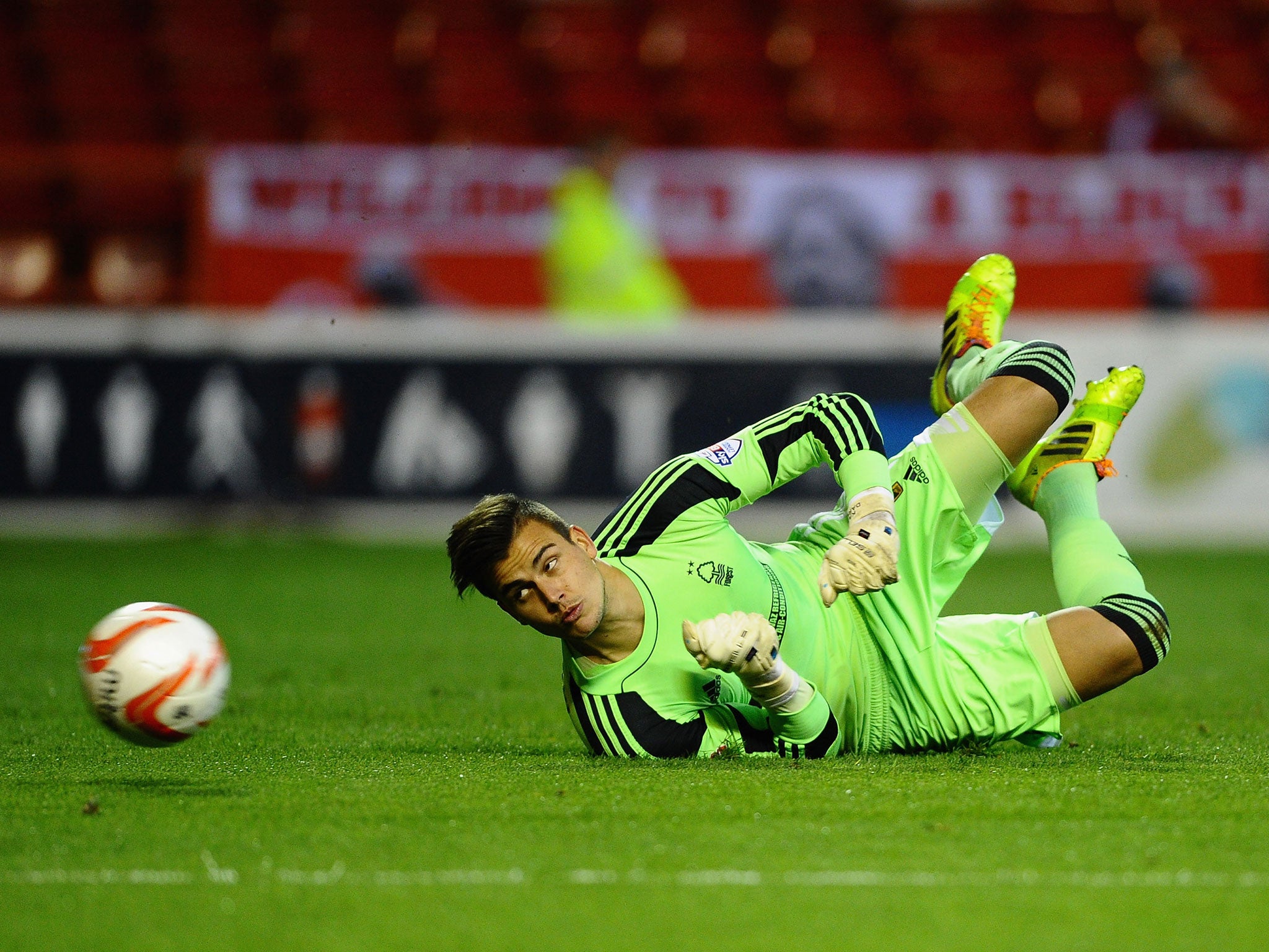 Karl Darlow of Nottingham Forest dives to make a save during the Sky Bet Championship match between Nottingham Forest and Sheffield Wednesday