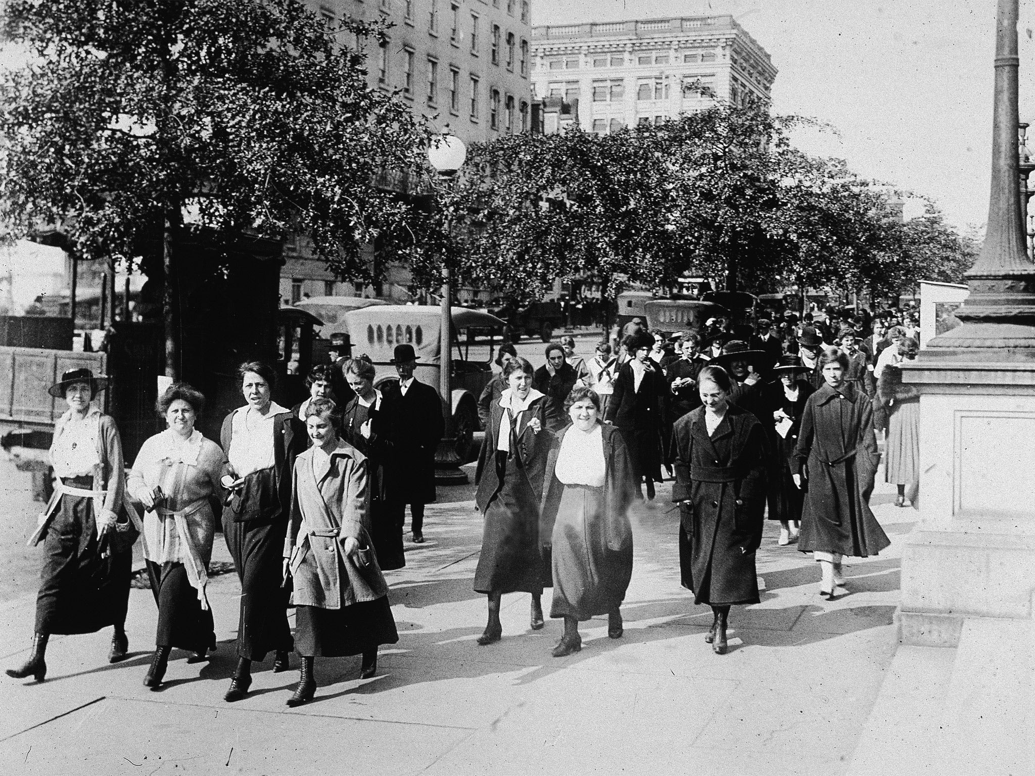 Women from the Department of War took 15-minute walks to breathe in fresh air to ward off the influenza virus during World War I (Getty)