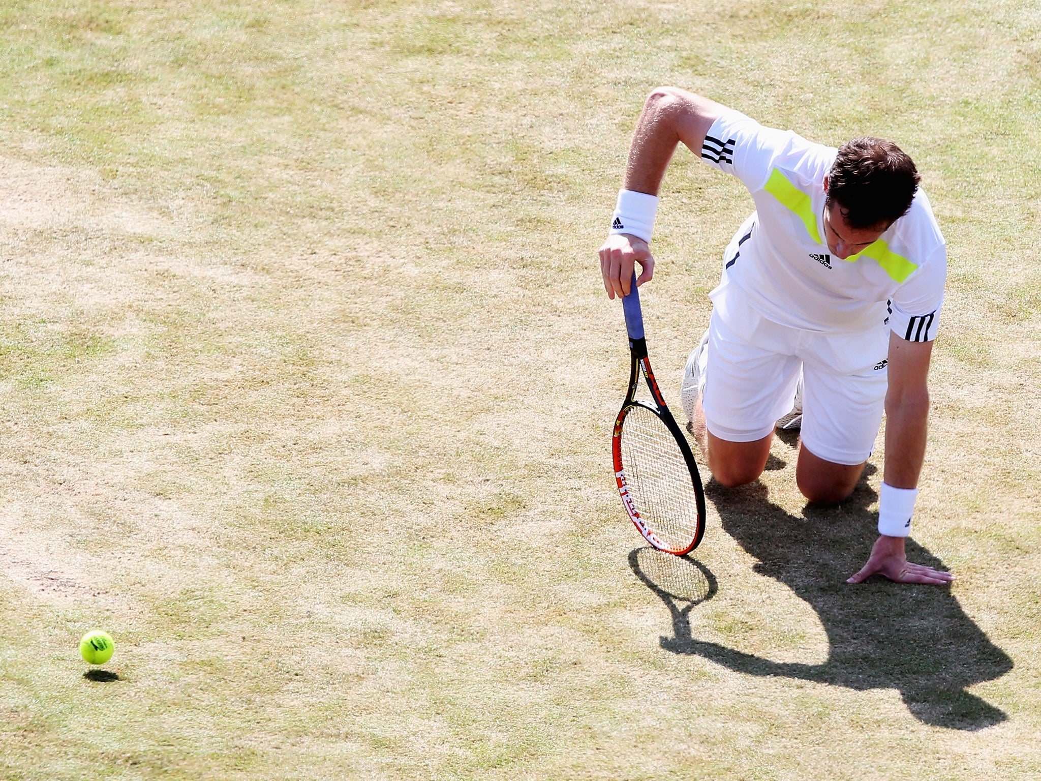 Andy Murray reacts during his defeat against Radek Stepanek of the Czech Republic at the Aegon Championships at Queen's