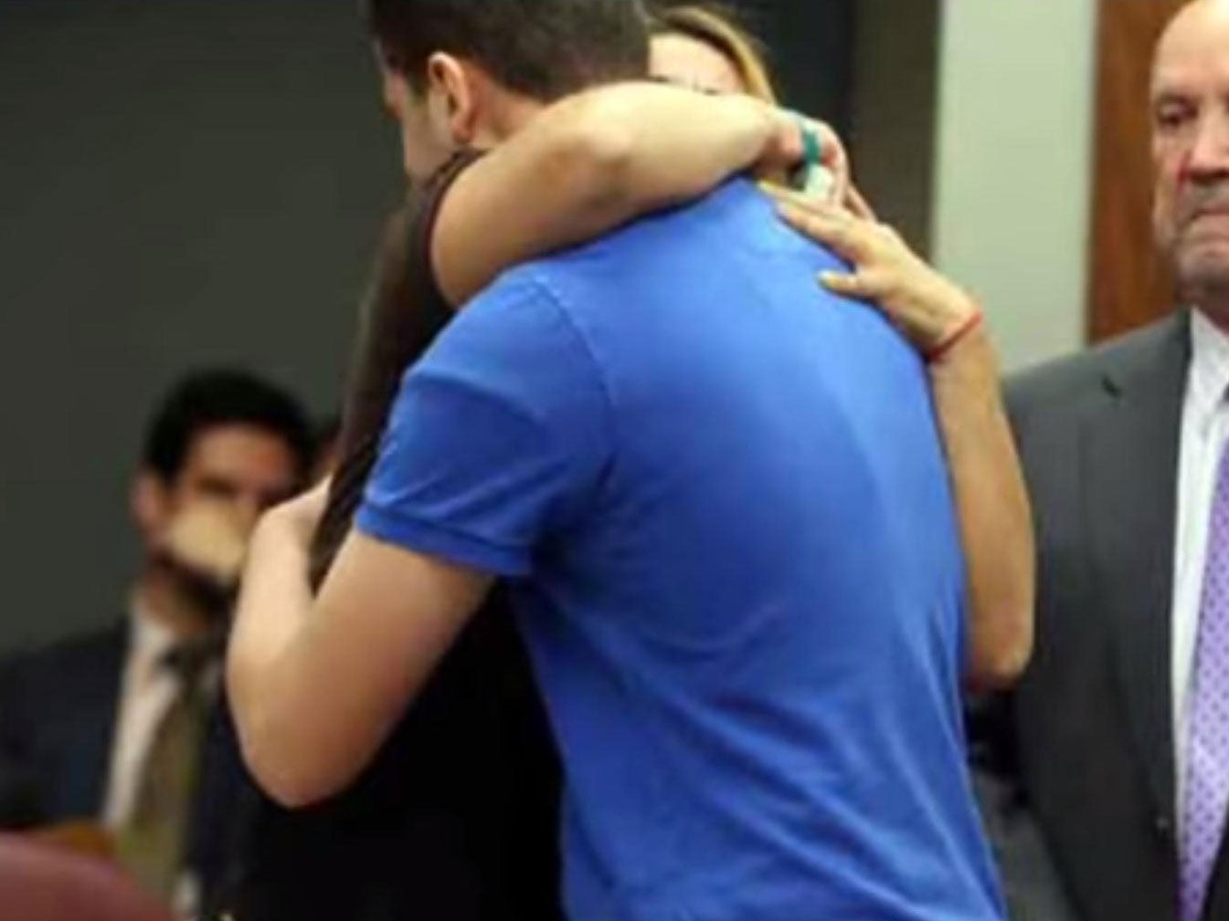 Ady Guzman-DeJesus hugs her daughter's killer, Jordyn Howe, in court.