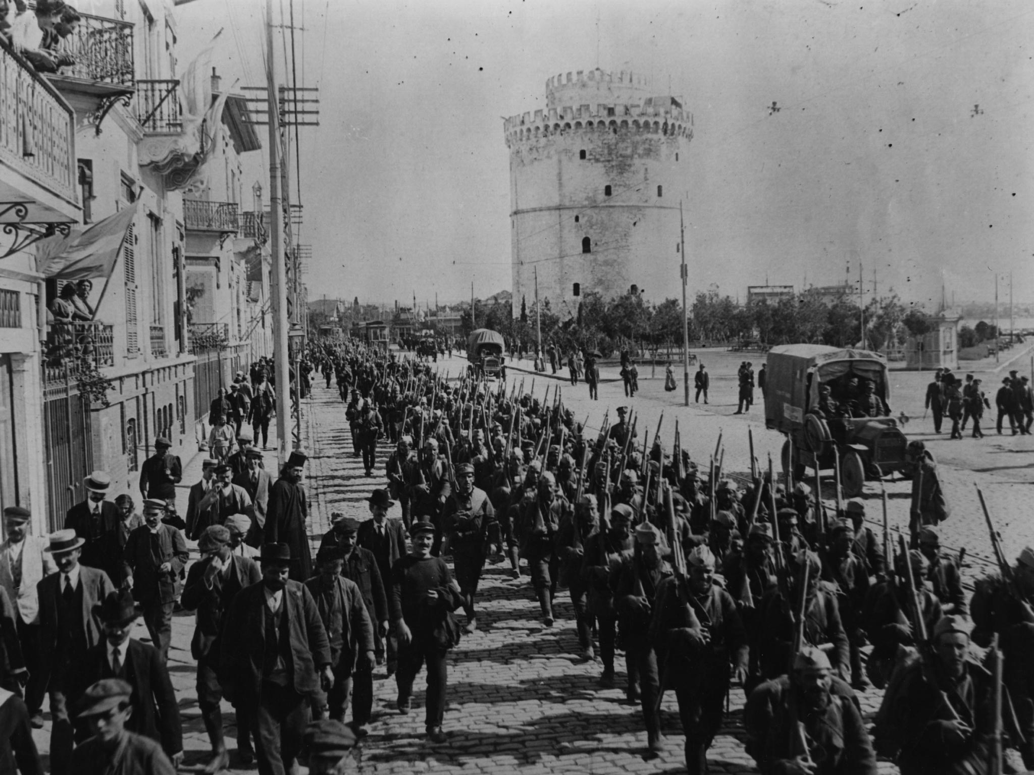 Allied troops marching down the Boulevard de la Victoire in Salonika in 1916, the year before the great fire which devastated the Greek city