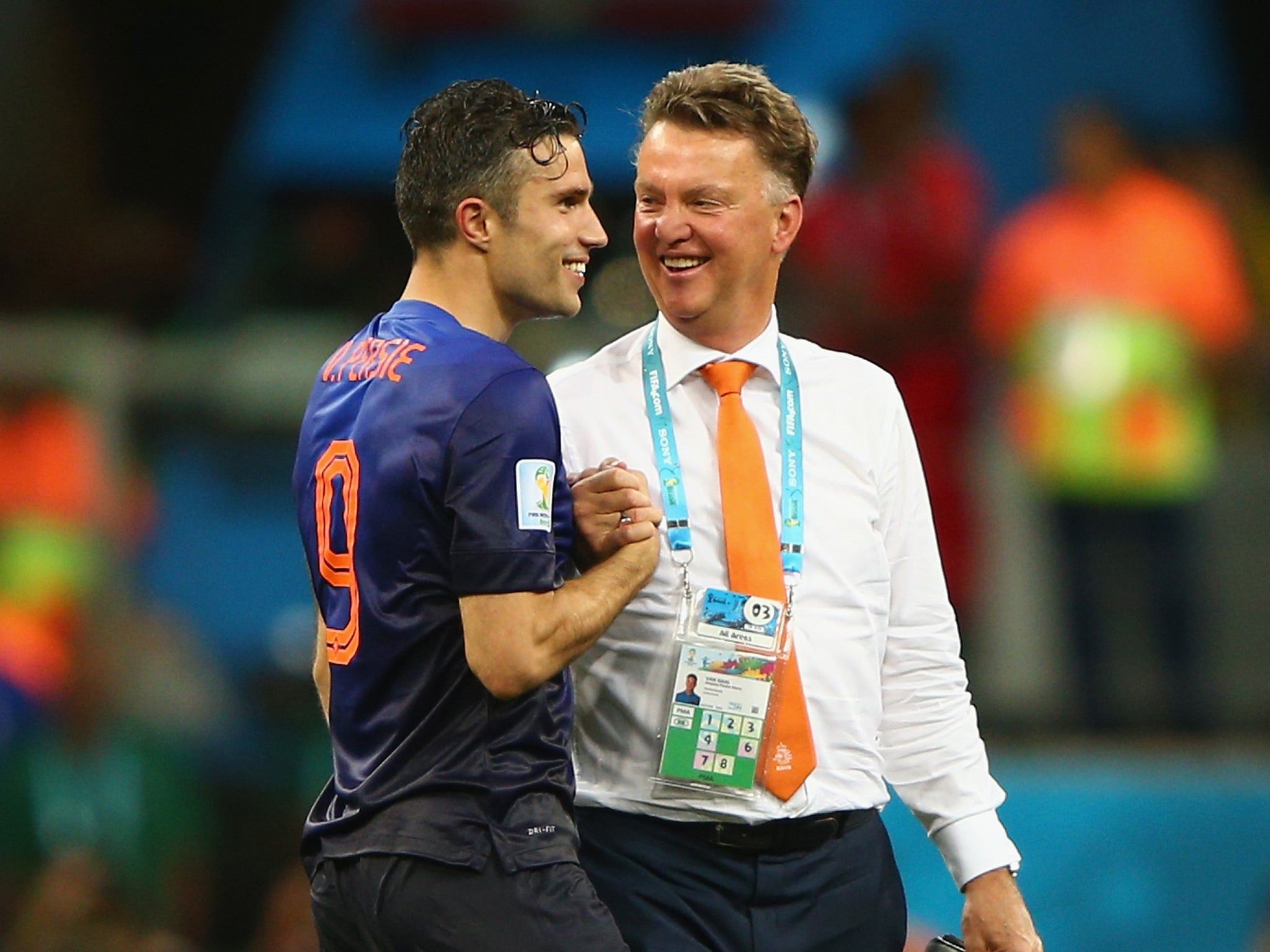 Louis Van Gaal and Robin van Persie celebrate