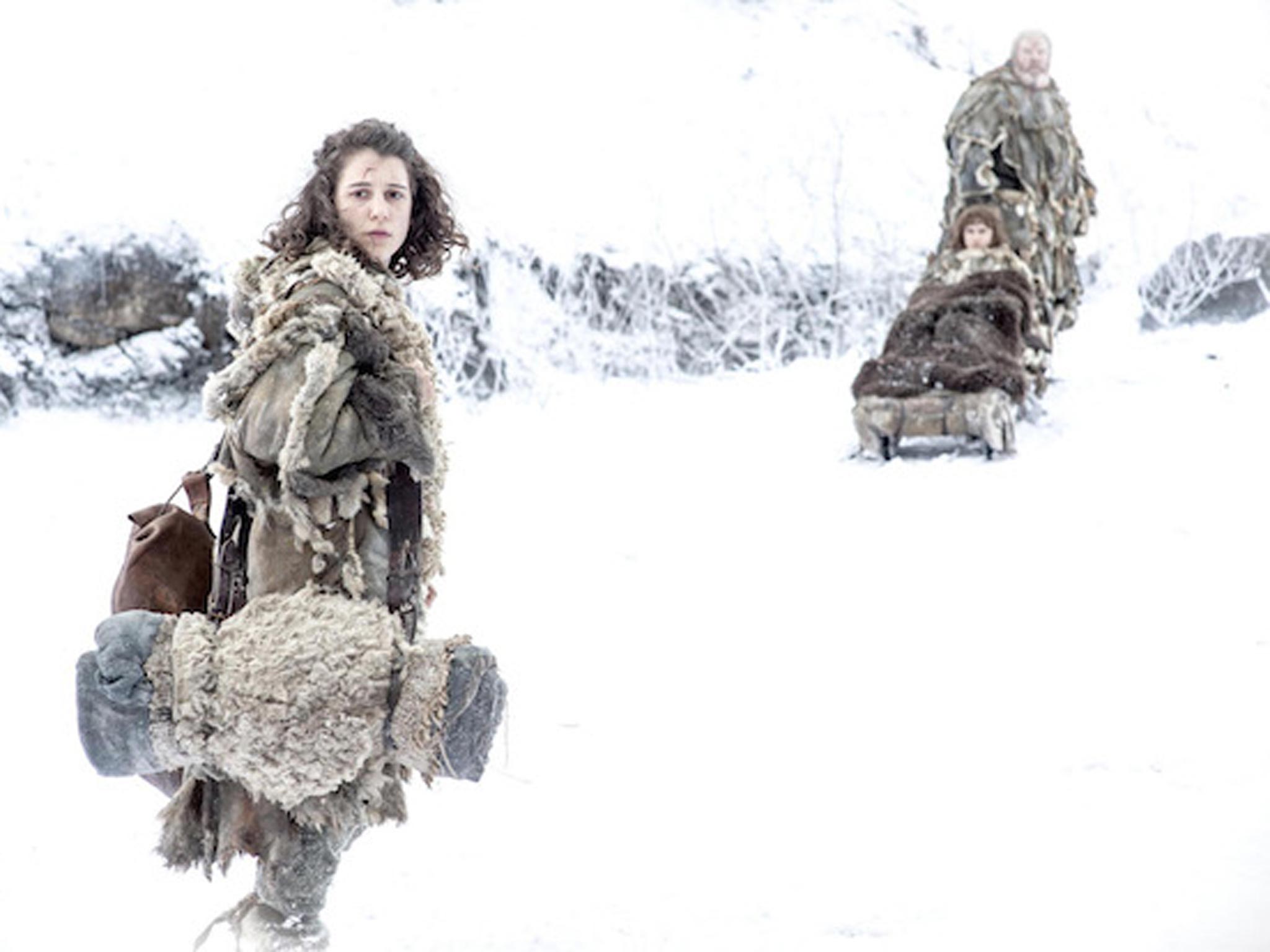 Meera Reed, Bran and Hodor walk through the snow to find the three-eyed crow