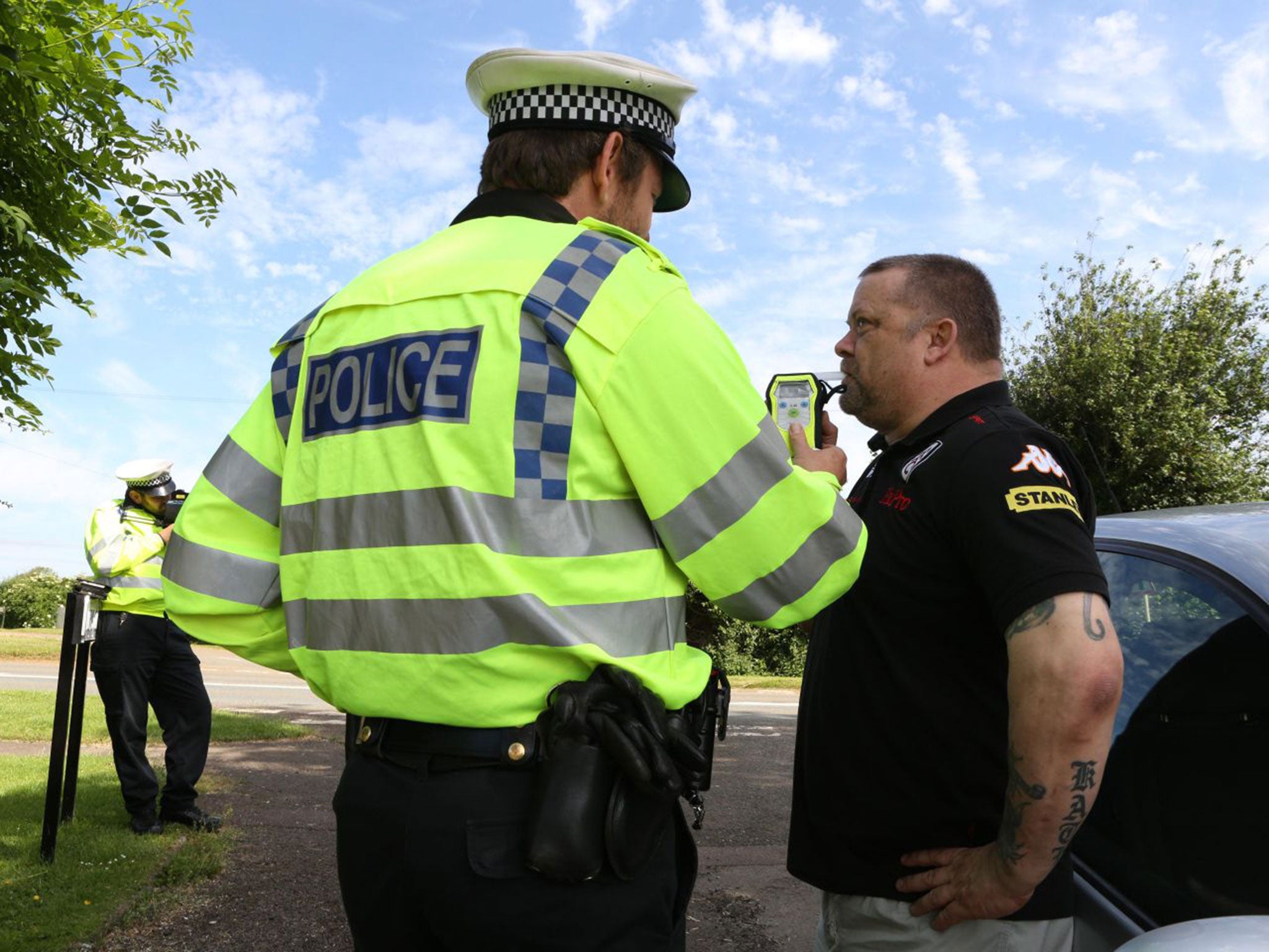 Breathalysing a motorist (Mykel M Nicolaou)