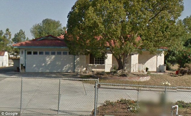 The house and driveway where the incident took place