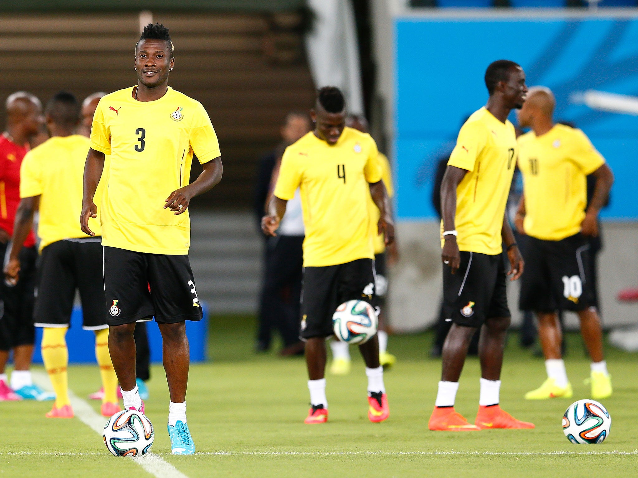 In the team camp the players relax and focus through traditional and religious song and dance