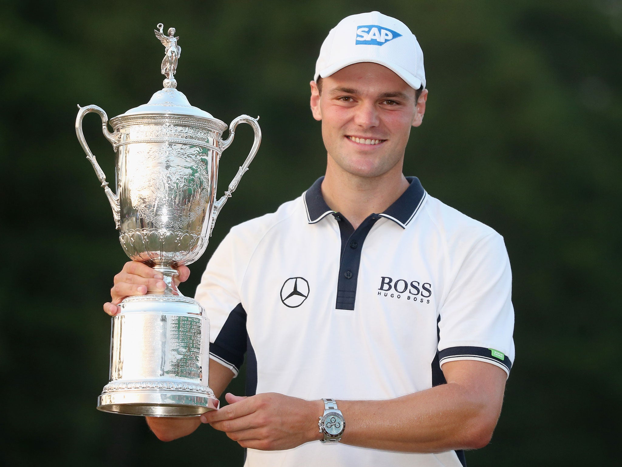 Martin Kaymer holds the trophy after his US Open triumph