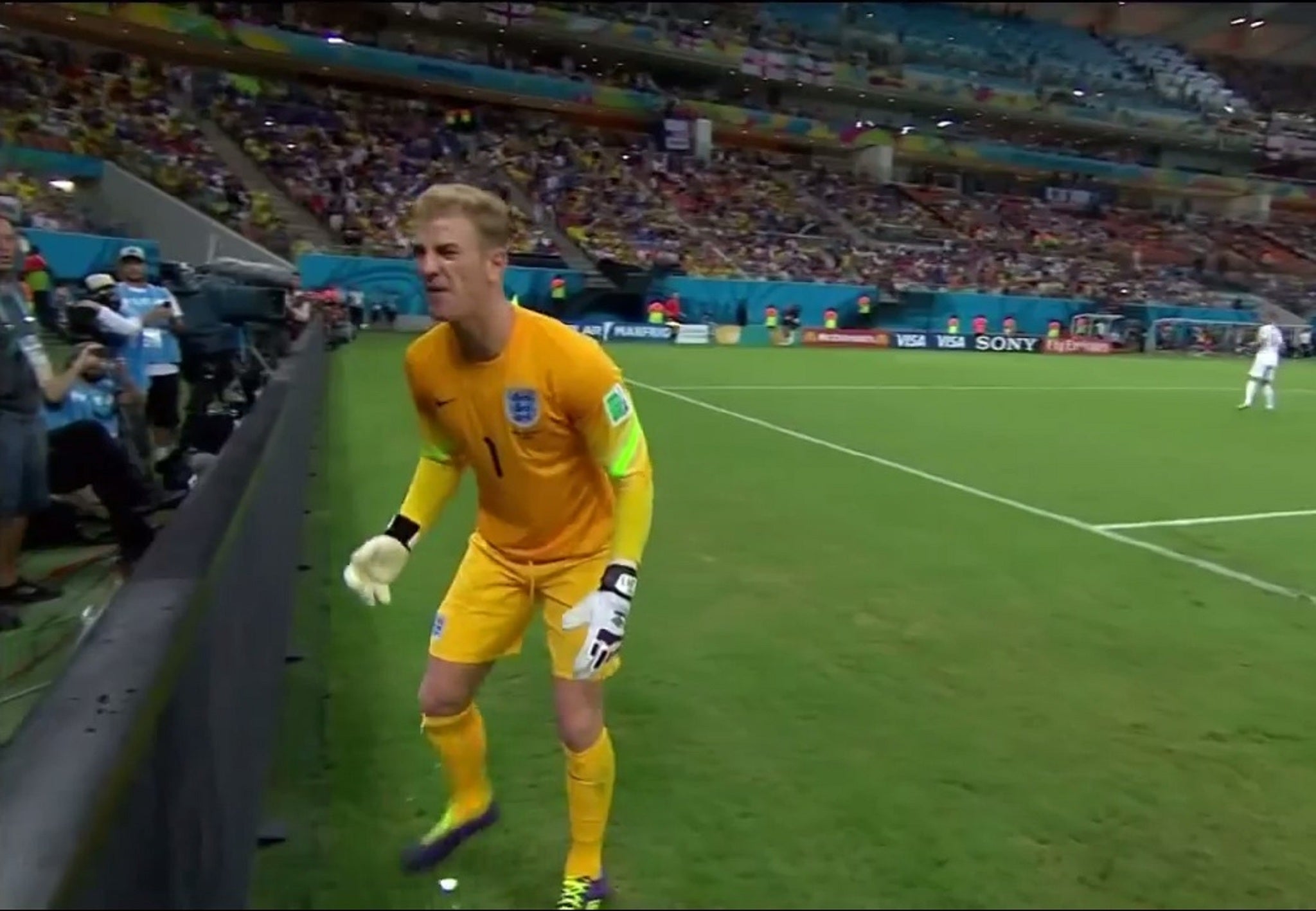 England goalkeeper Joe Hart attempts to retrieve the ball during England's 2-1 defeat to Italy