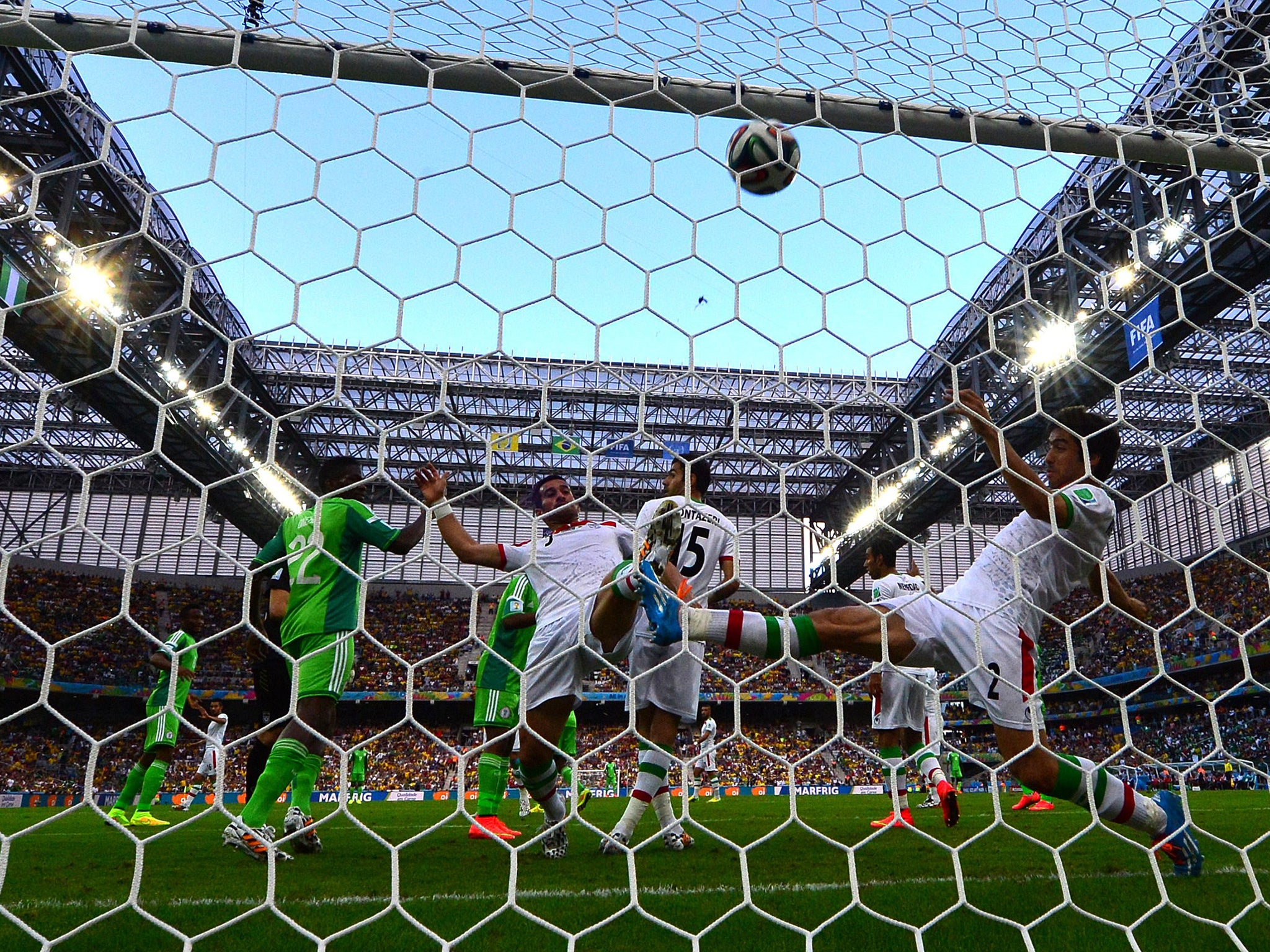 Some rare goal-mouth action during the 0-0 draw between Iran and Nigeria