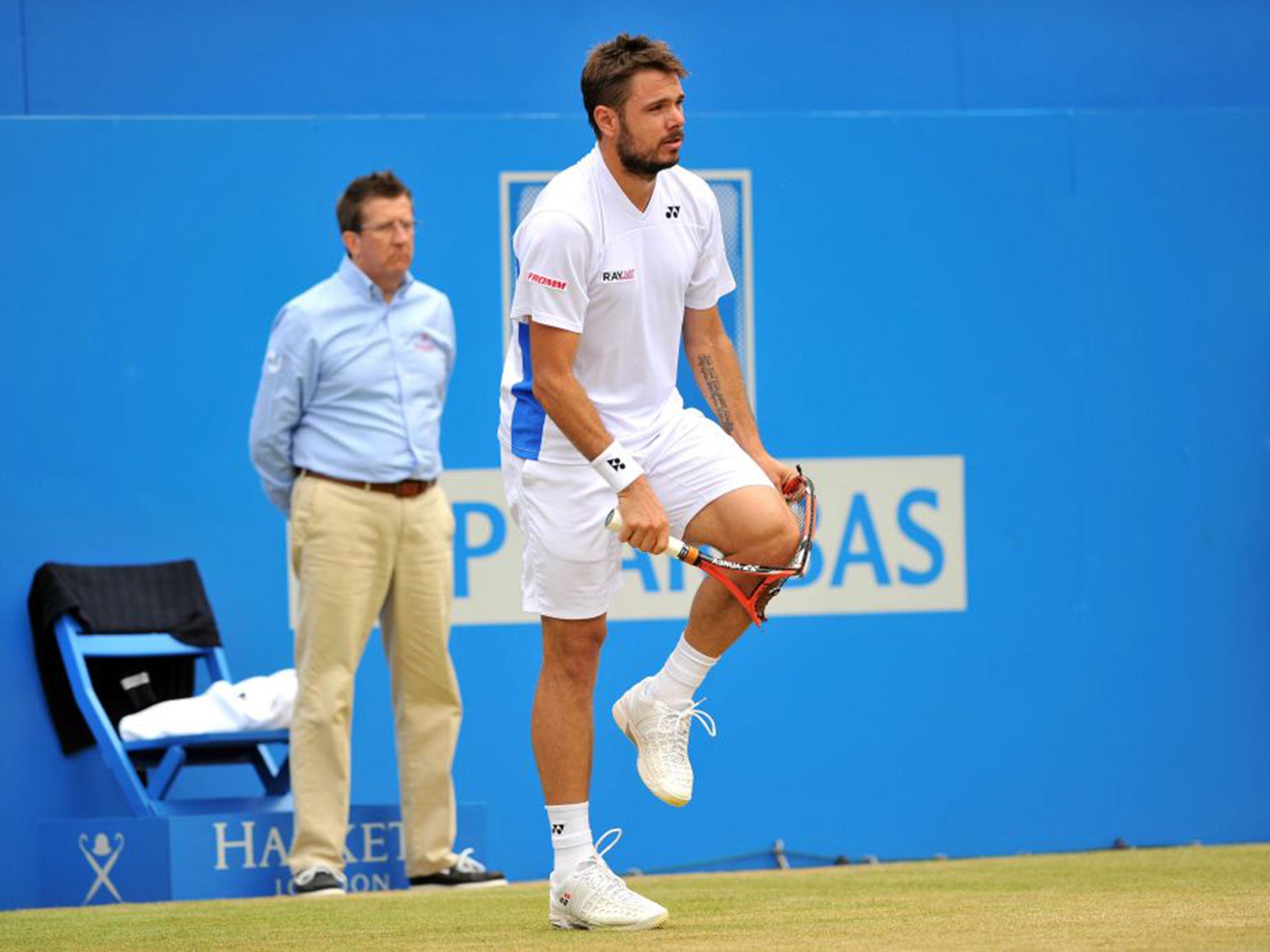 Stanislas Wawrinka smashes his racket at Queen’s Club last week