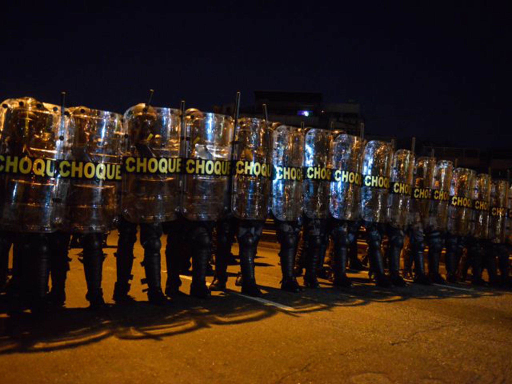 Police block anti-World Cup protesters attempting to march to the Maracana stadium