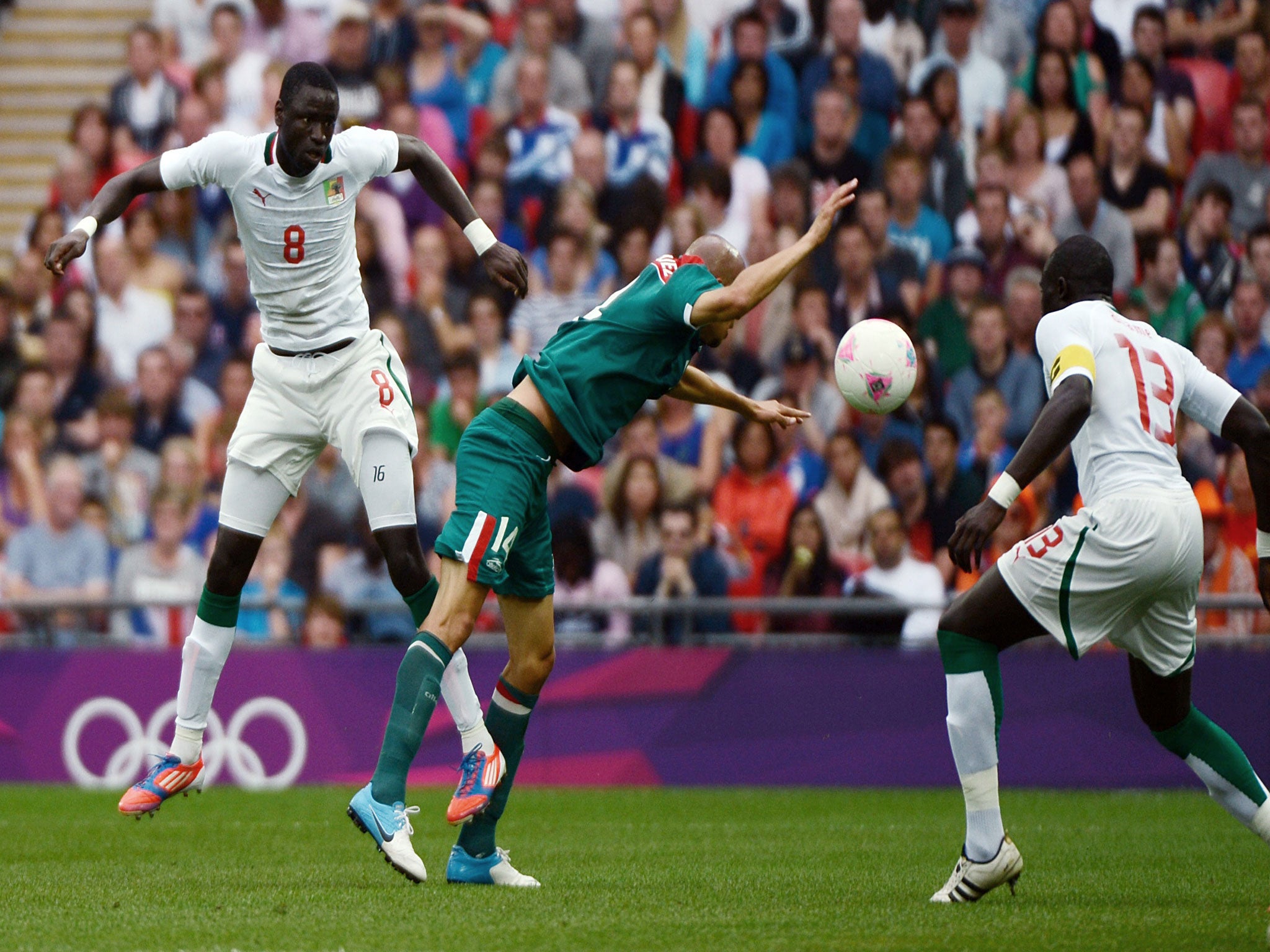 Cheikhou Kouyate (left) and Mohamed Diame (right), pictured playing for Senegal, will be reunited together at West Ham